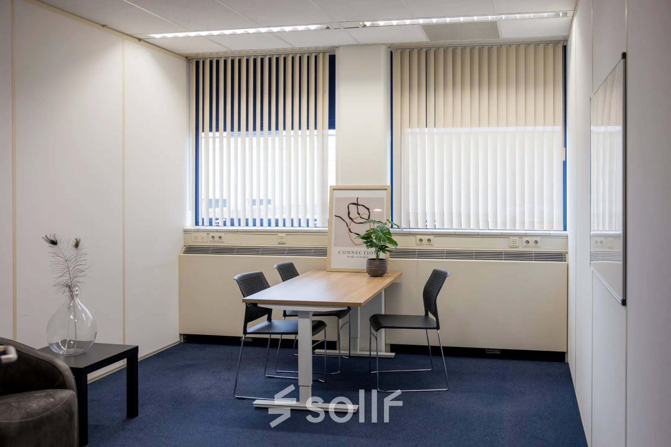 Bright office space rental available with a table and chairs at Markerkant 1310, Almere Stad. Ideal office to rent for meetings or collaborative work.