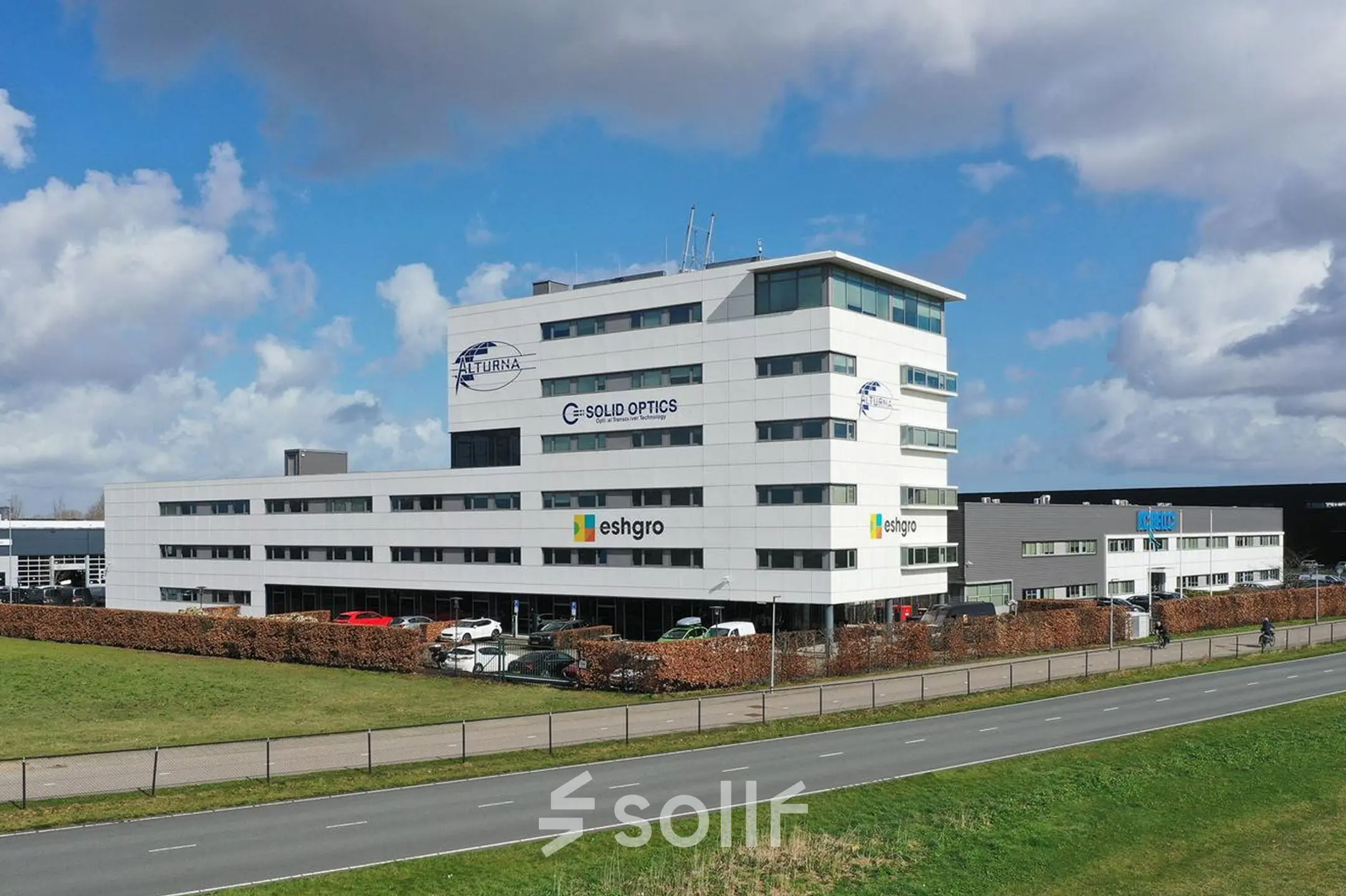 Exterior view of office building at Veluwezoom 15, Almere Stad, ideal for office space rental.