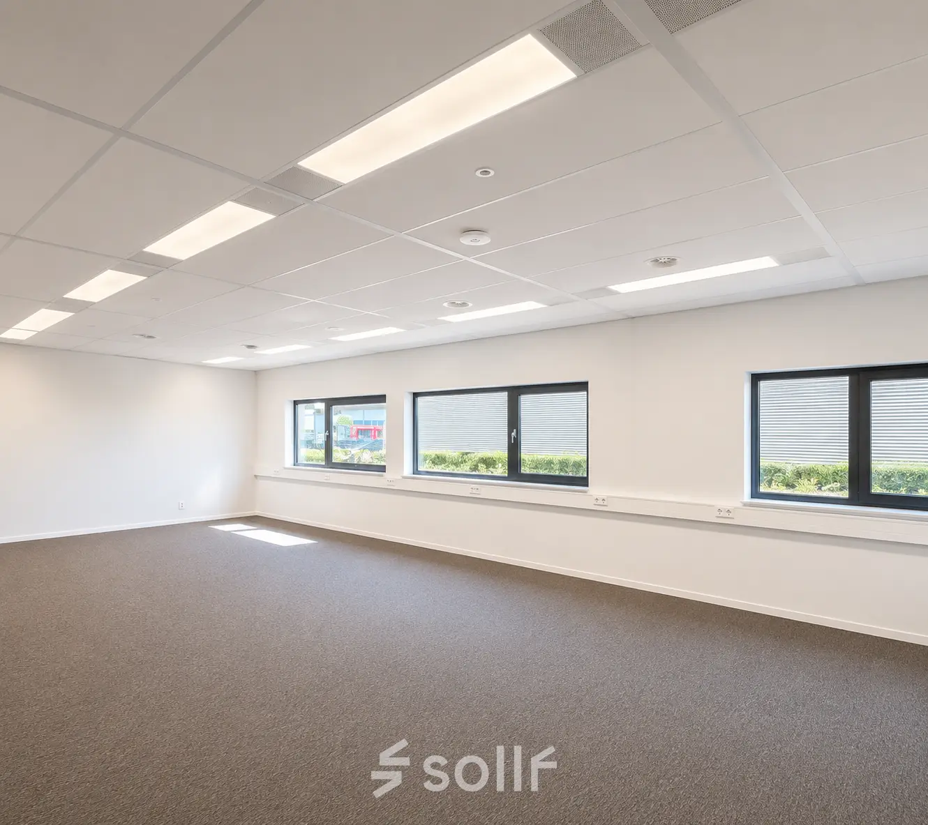 Well-lit office space at Veluwezoom 15, Almere Stad, ideal for businesses seeking office space rental.