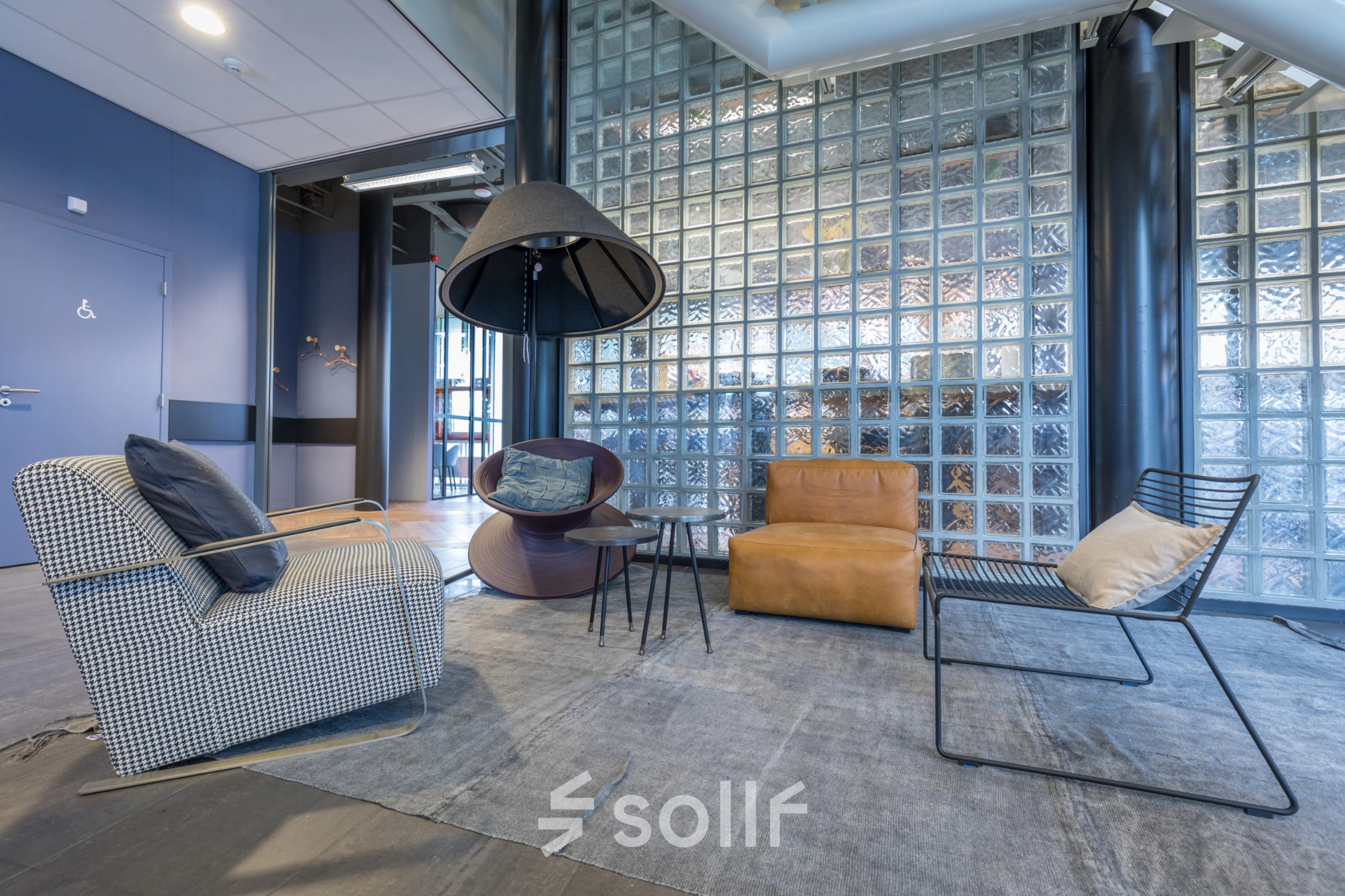 Stylish office to rent at Maanlander 47, Amersfoort Calveen, featuring cozy lounge seating and modern design elements for office space rental.