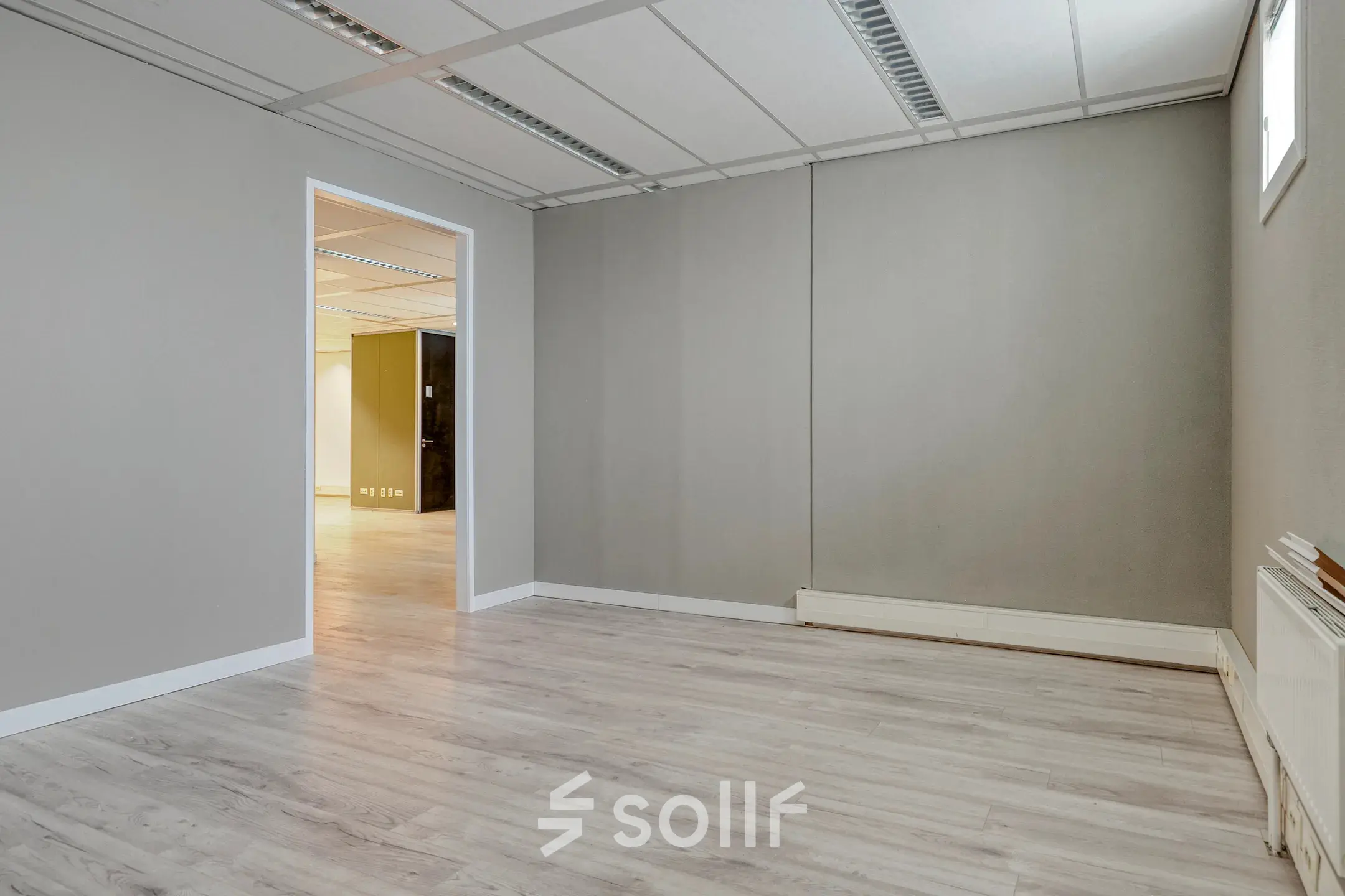 Spacious empty office interior at Asch van Wijckstraat 2-4, ideal for rent office space in Amersfoort Centrum.