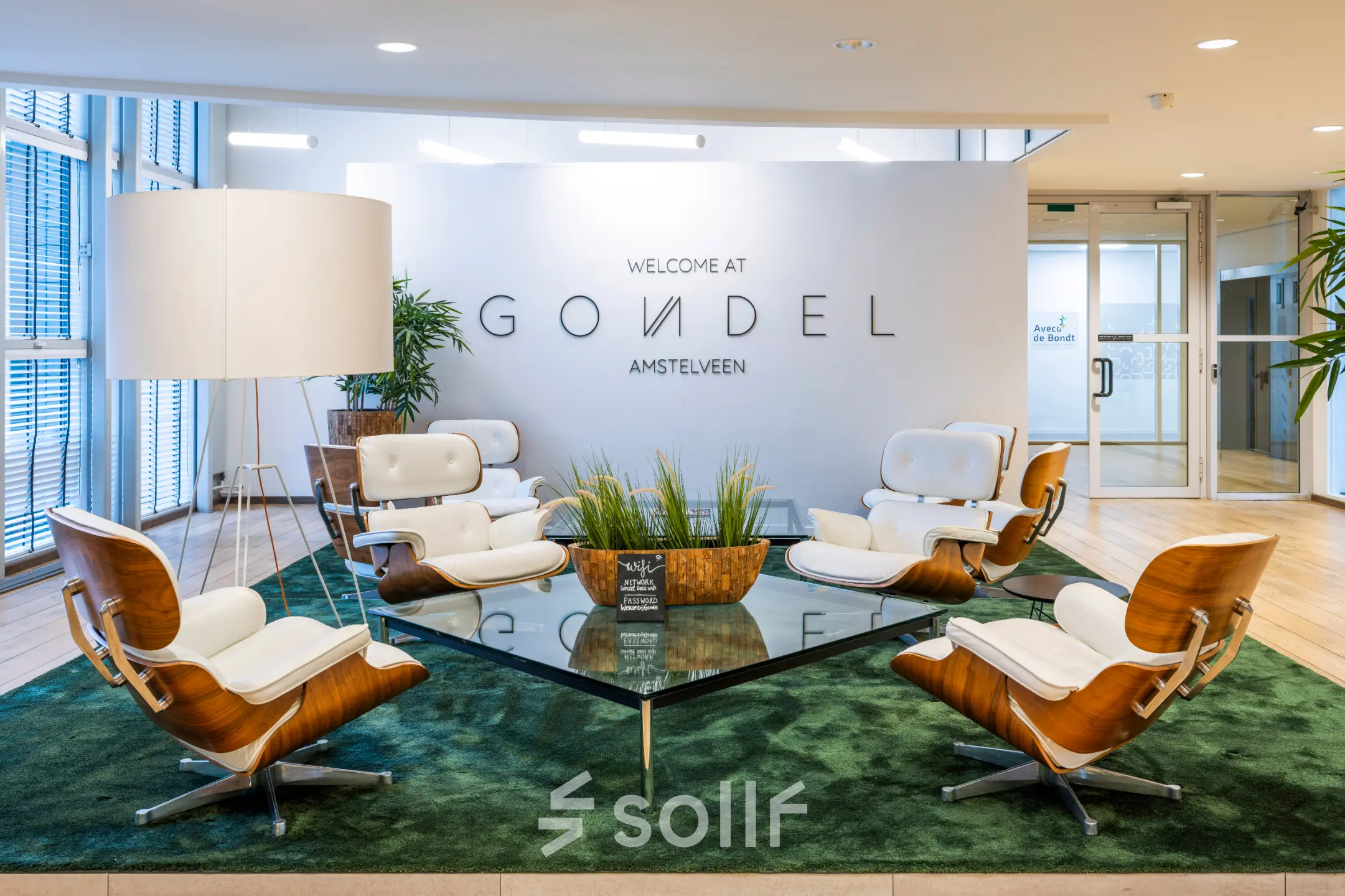 Modern, furnished lounge area at De Gondel 1, Amstelveen, ideal for office space rental with stylish seating and decor.