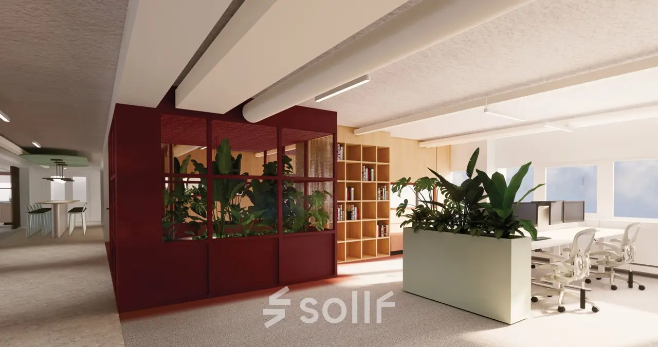 Bright office space for rent at Stroombaan 4 in Amstelveen, featuring modern furnishings, large windows, and indoor plants.