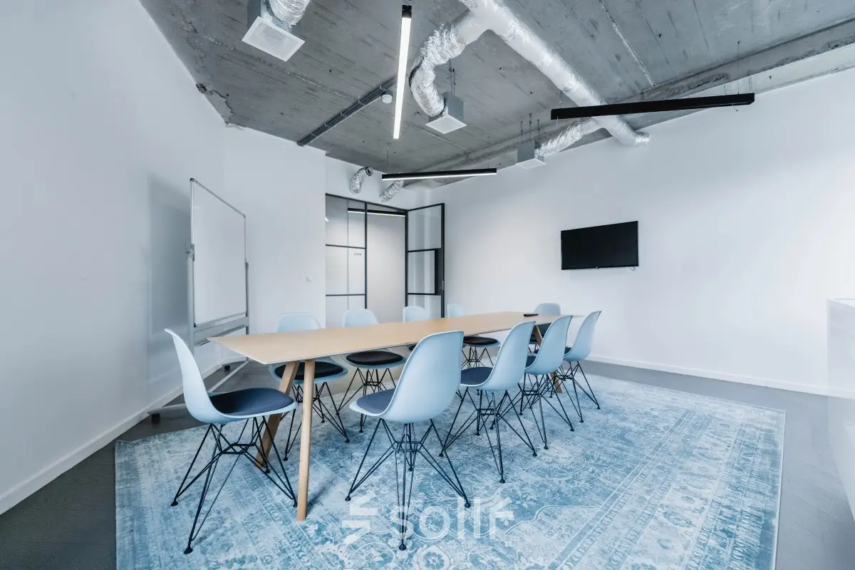 Modern office space with a large table and chairs at H.J.E. Wenckebachweg 90-108, Amsterdam Amstel Business Park, ideal for office space rental.