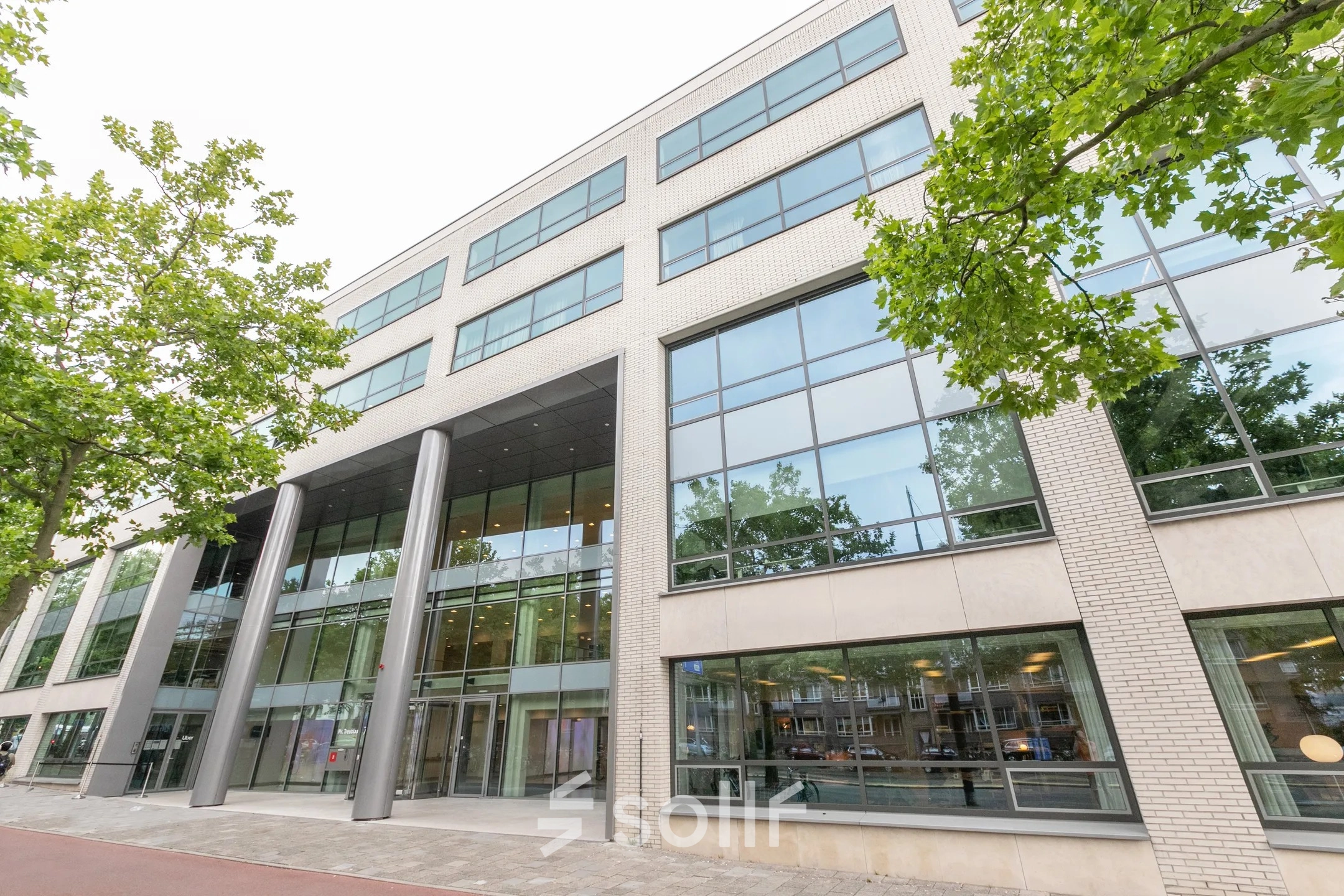 Exterior view of the office building at Mr. Treublaan 7 in Amsterdam Amstel, available for office space rental.