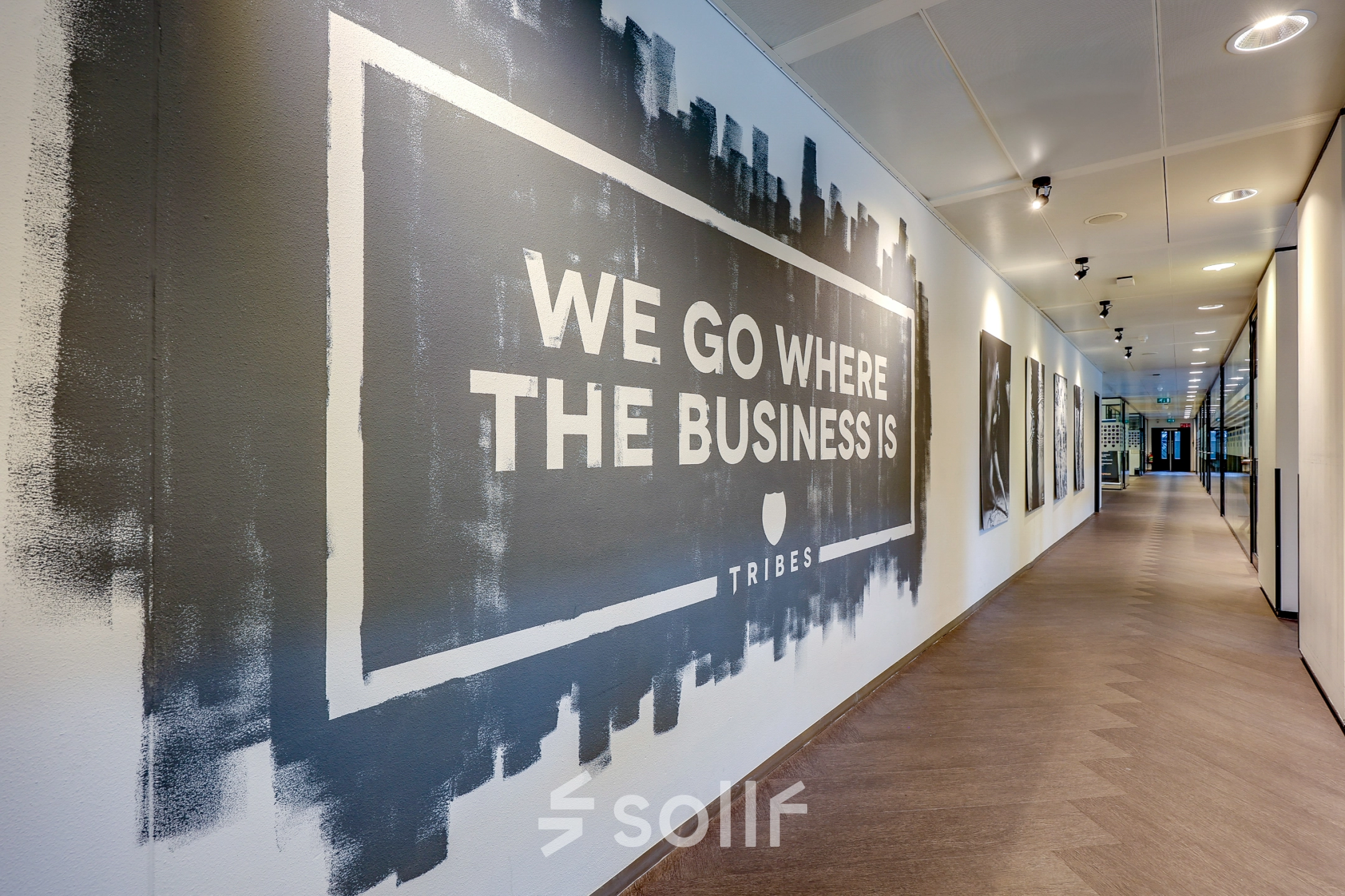 Contemporary hallway at Prins Bernhardplein 200, Amsterdam Amstel; features motivational wall art ideal for a rented office space.