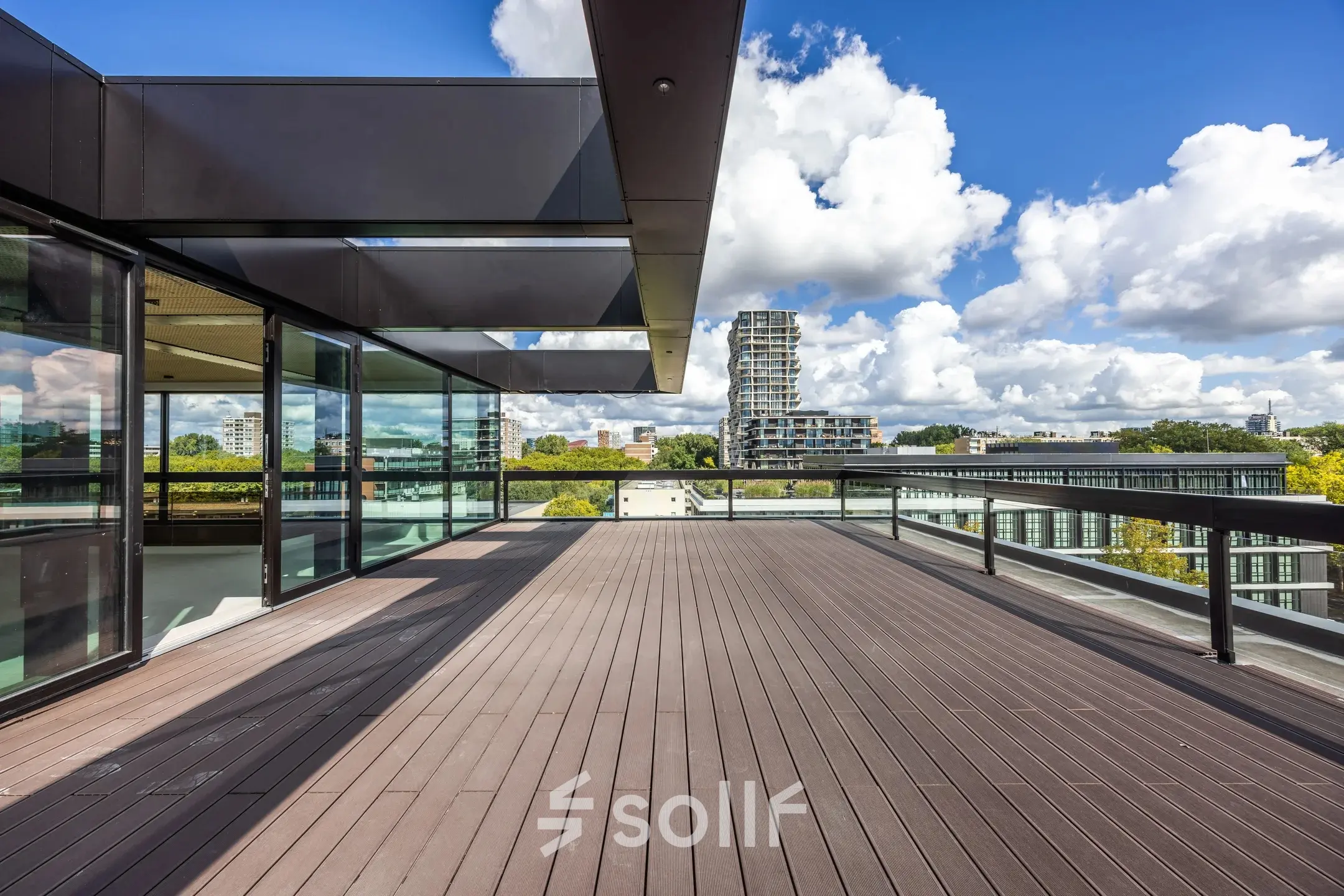 Spacious office terrace at Zwaansvliet 1, Amsterdam Buitenveldert, perfect for breaks or informal meetings, offering panoramic views. Consider this unique office space rental in a vibrant location.