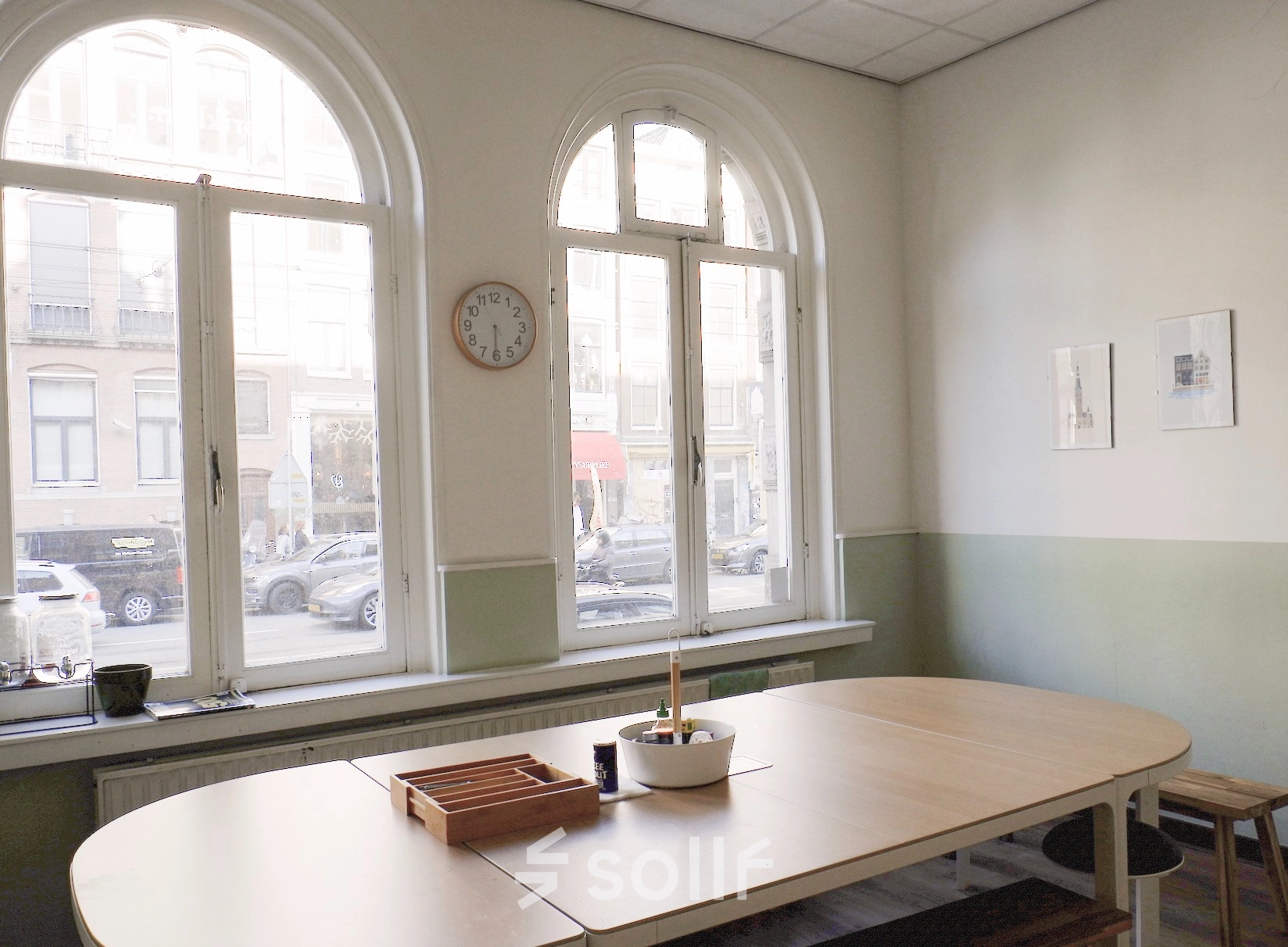 Bright office space at Raadhuisstraat 15, Amsterdam Center, suitable for rent office space, with large windows and a minimalistic design.