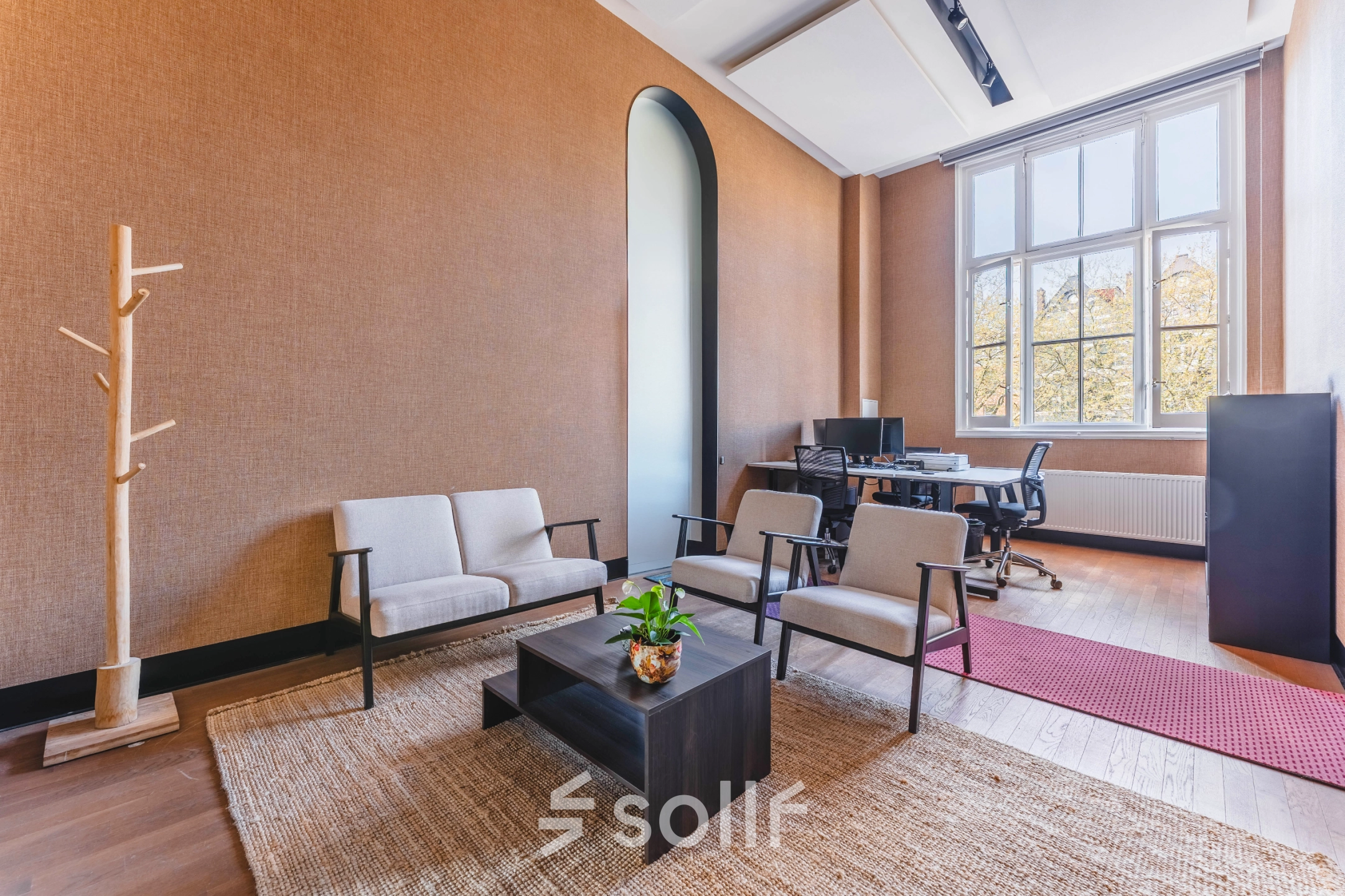 Cozy office space with natural light, ideal for office space rental at Raamplein 1, Amsterdam Center.