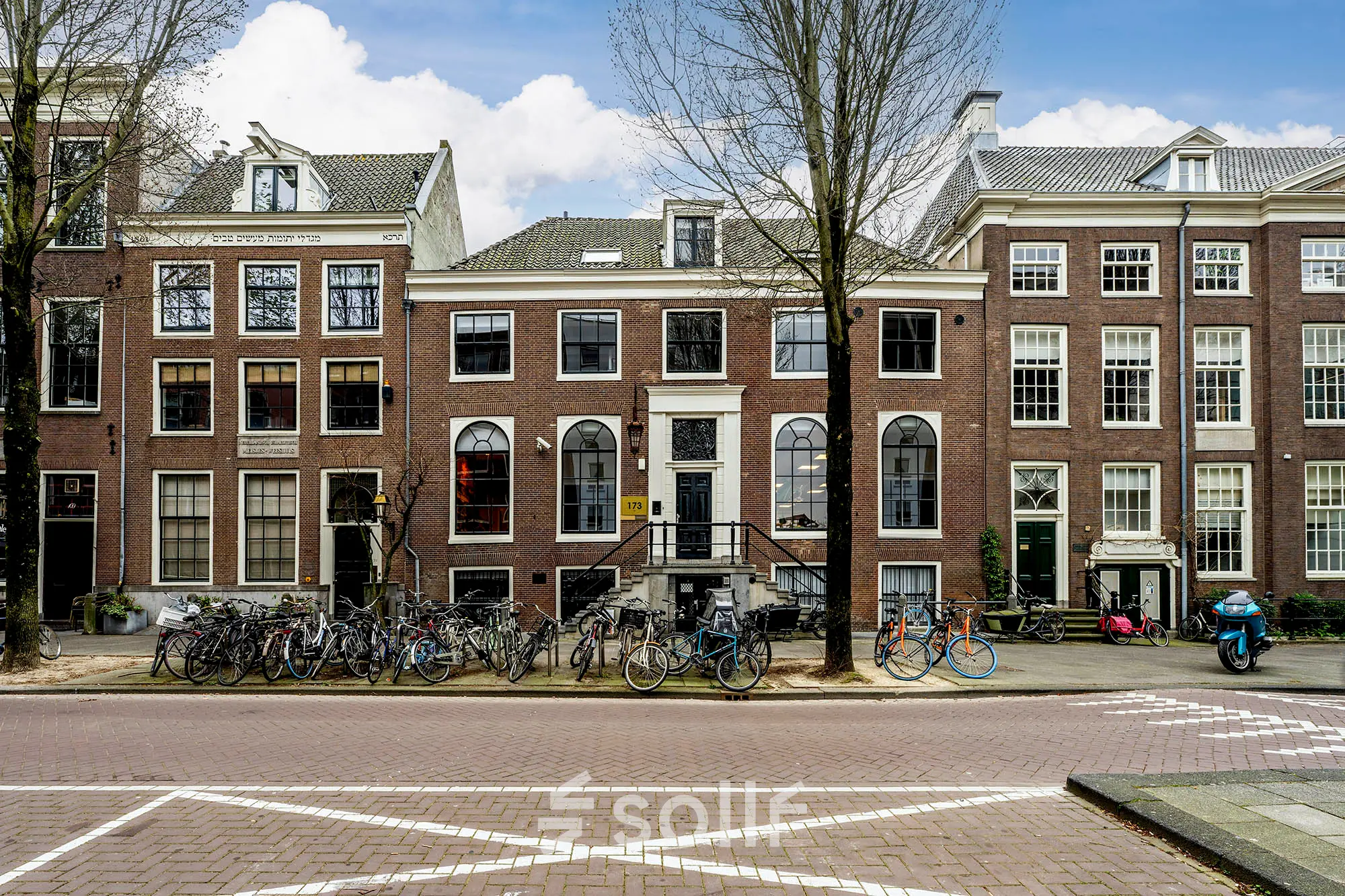 Exterior view of office building at Rapenburgerstraat 173, Amsterdam Center, available for rent.