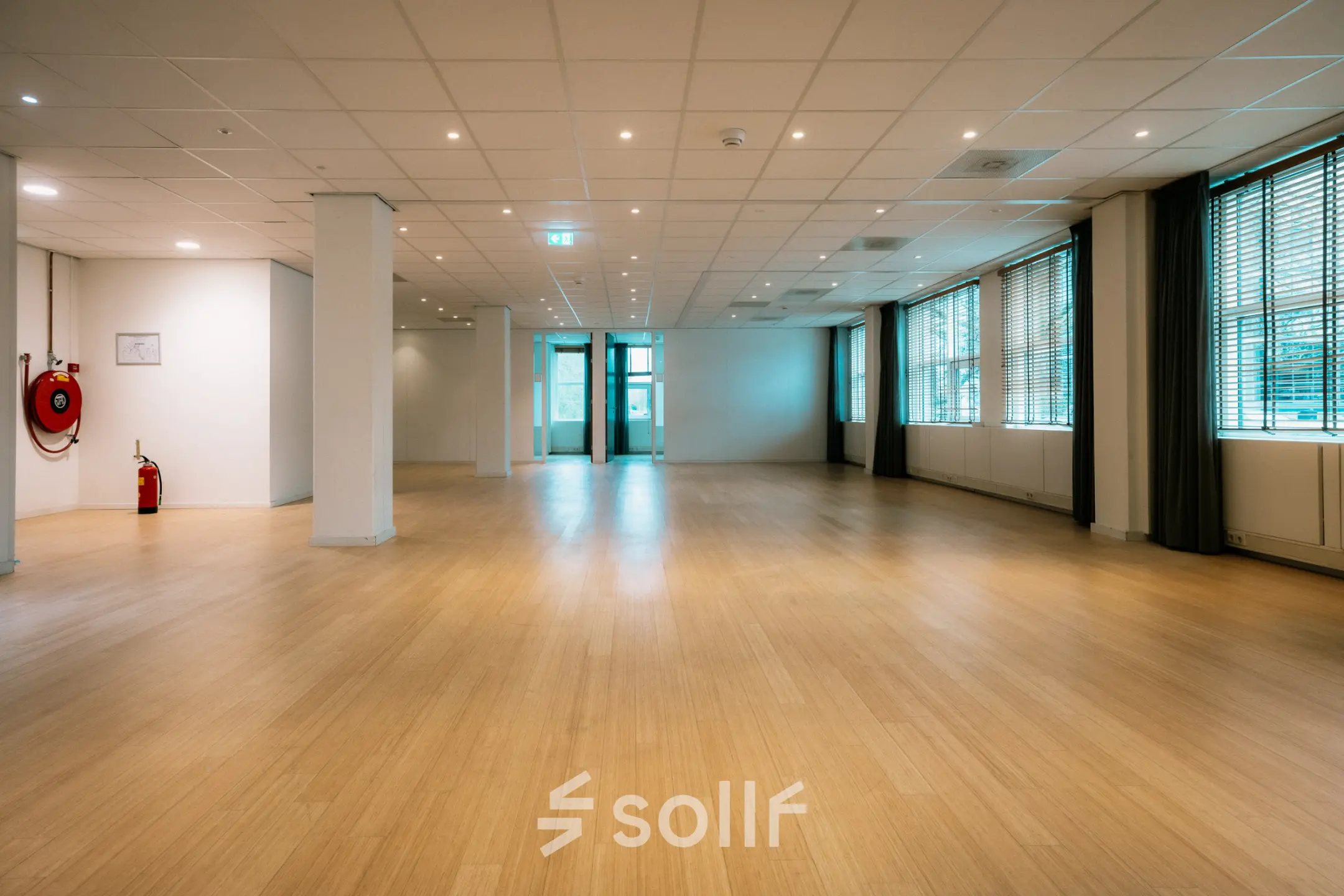 Spacious office to rent at Overschiestraat 182, Amsterdam De Schinkel with wooden flooring and ample natural light.
