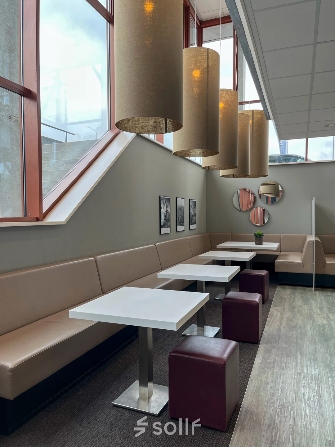 Bright office space rental at Daalwijkdreef 47, Amsterdam Duivendrecht with contemporary seating and ample lighting, ideal for dynamic workspaces.