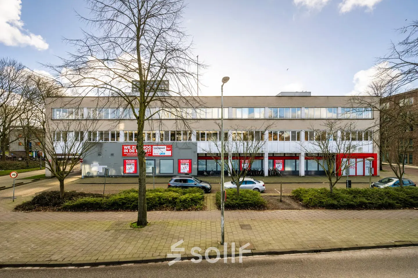 Exterior view of office building at James Wattstraat 71 in Amsterdam East with available office space for rent.
