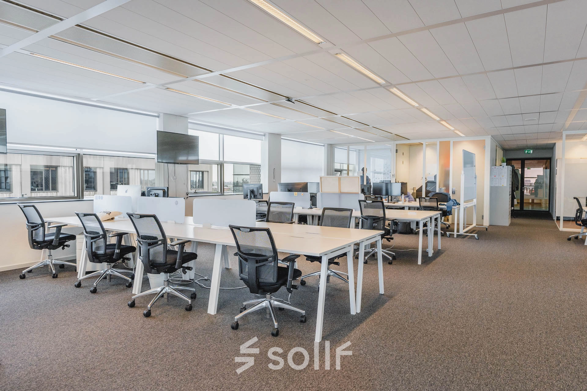 Bright and spacious office at Piet Heinkade 95B, Amsterdam East, featuring multiple workstations perfect for rent office space.
