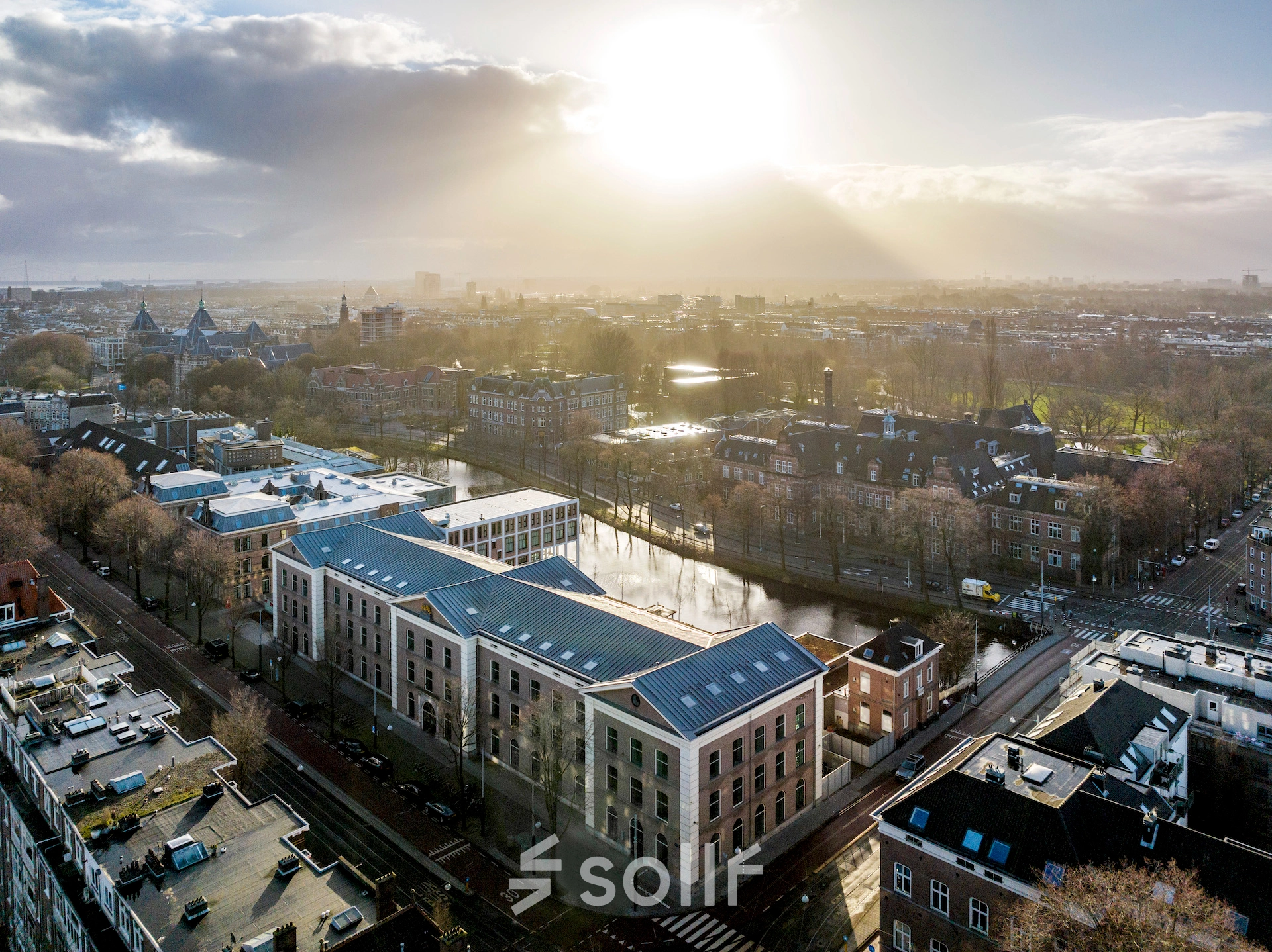 Aerial view of buildings on Sarphatistraat 370, Amsterdam East, showcasing potential office space rental locations.