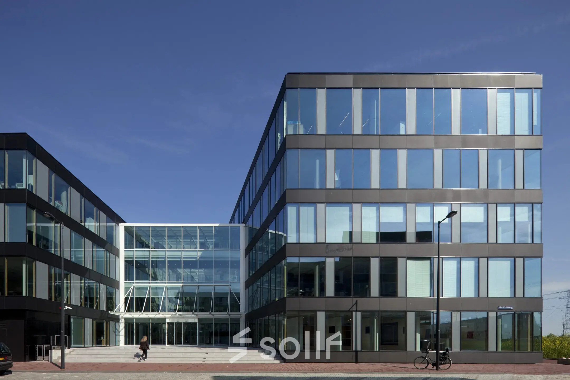 Exterior view of office building at Pedro de Medinalaan 7, Amsterdam IJburg, showcasing modern architecture perfect for office space rental.