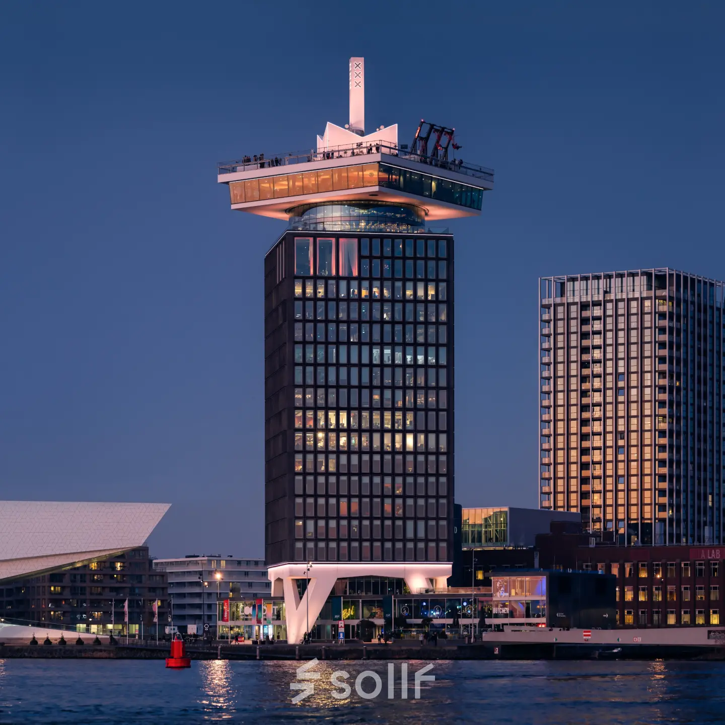 View of the A'DAM Tower at Overhoeksplein 1 in Amsterdam North, perfect for office space rental with striking architecture.