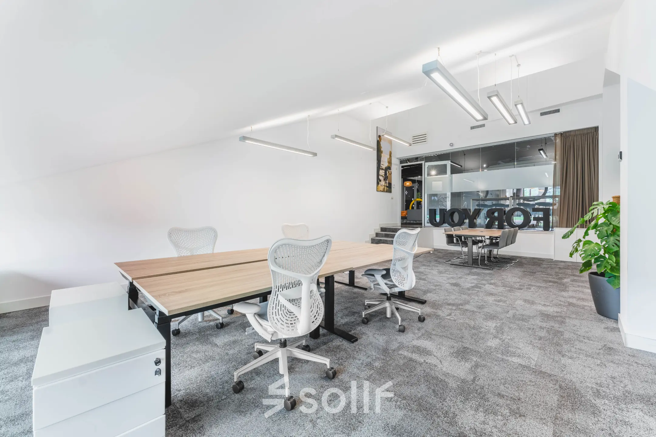Modern office space at Olympisch Stadion 24-28 in Amsterdam Old South with sleek furnishings and ample natural light, ideal for office space rental.