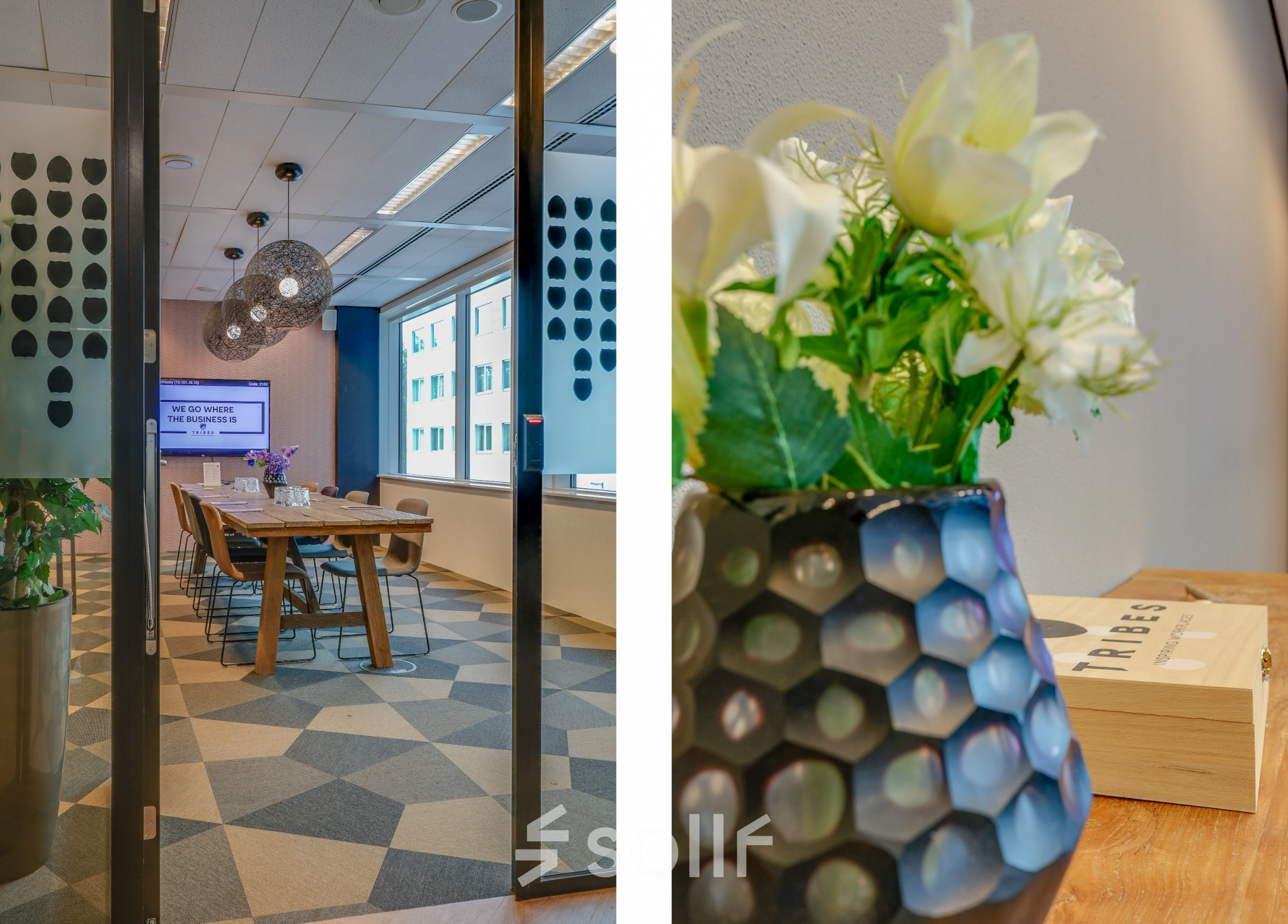 Stylish conference room in Amsterdam Riekerpolder at Thomas R. Malthusstraat 1-3, featuring a large table, chairs, modern lighting, and a decorative plant. Ideal office space rental.