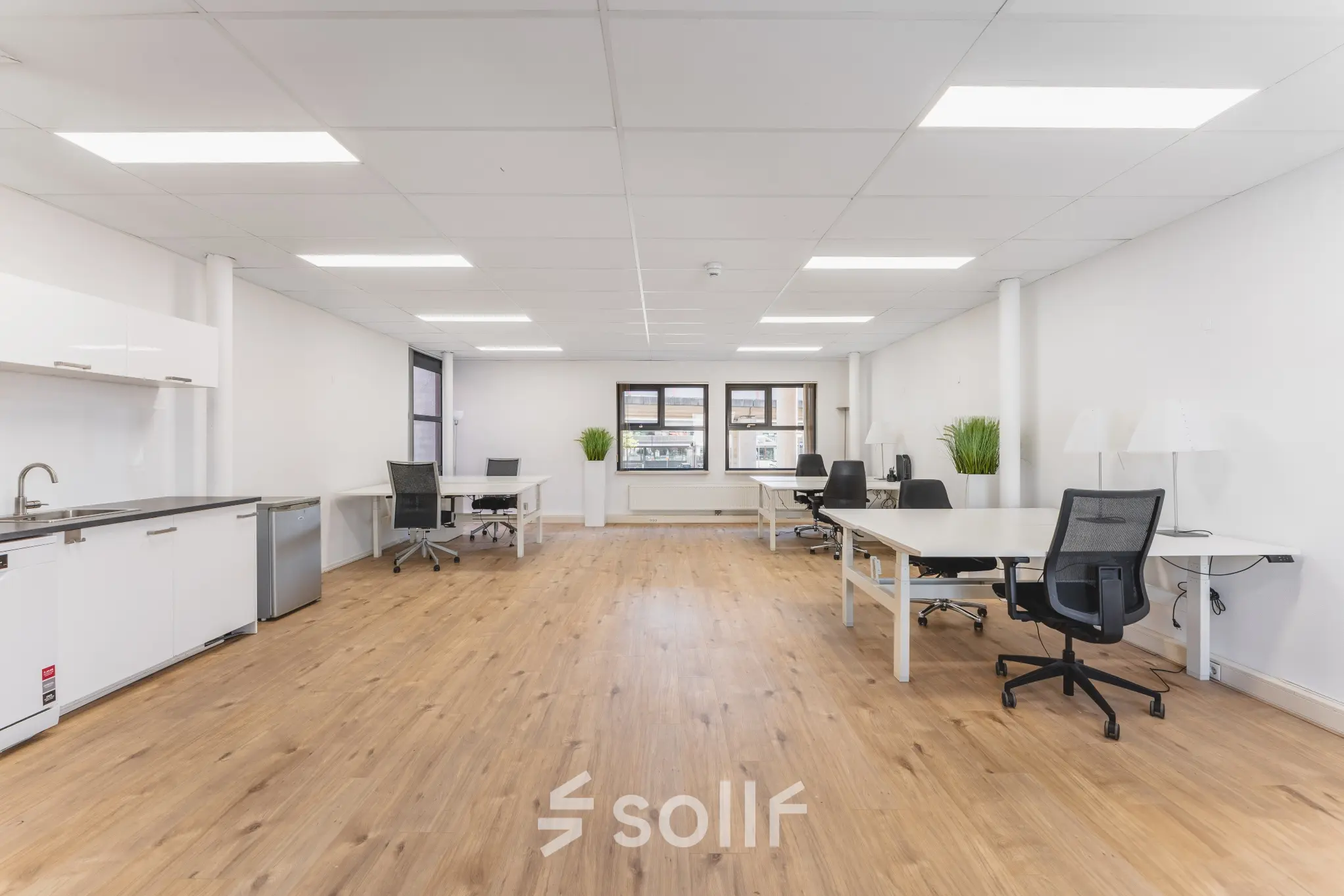 Bright and airy office space with modern furnishings and large windows, available for rent at Arlandaweg 92, Amsterdam Sloterdijk.