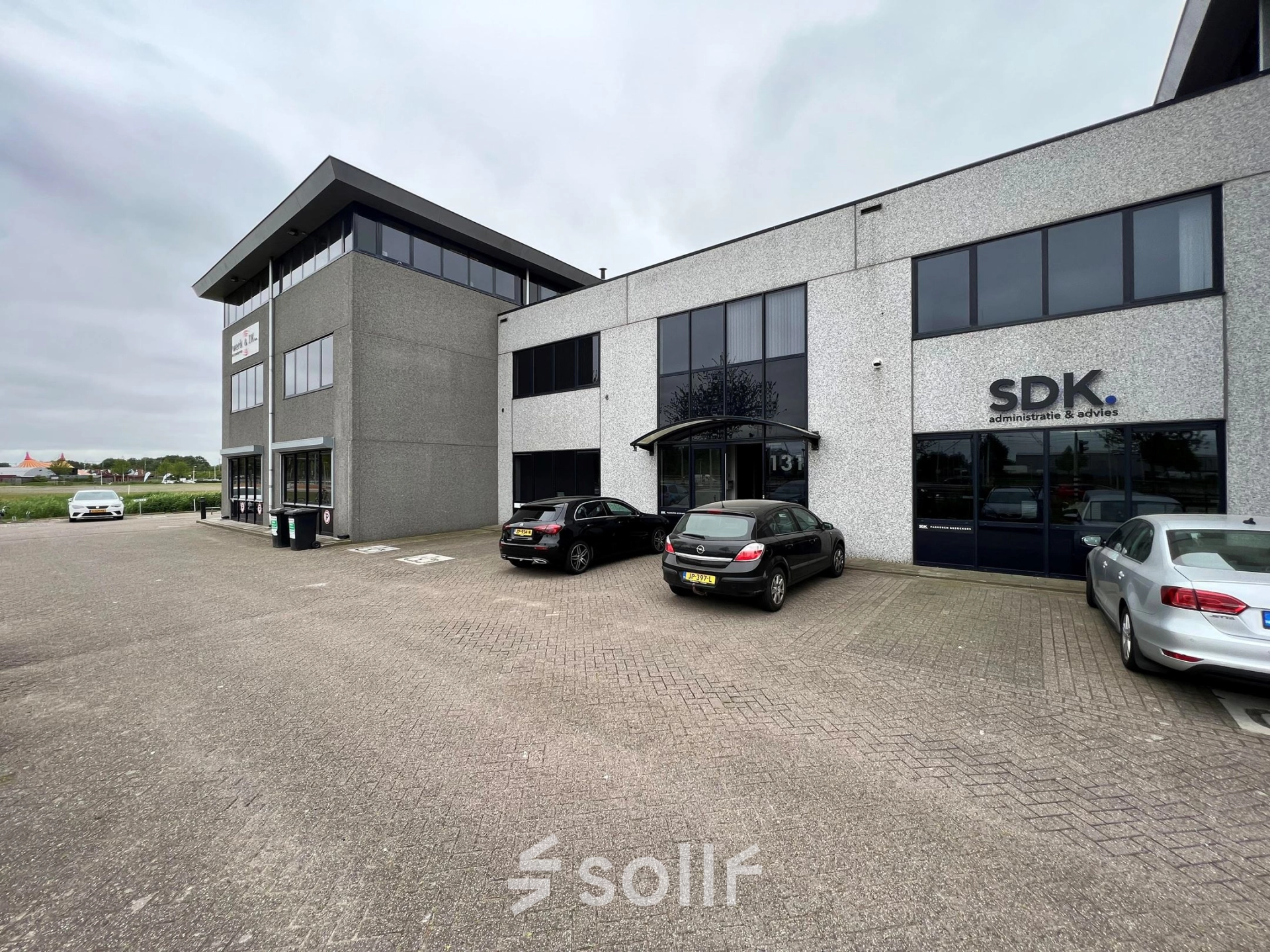 Exterior view of the office building at Contactweg 131 in Amsterdam Sloterdijk, showcasing a modern facade. Ideal for those seeking office space rental opportunities.