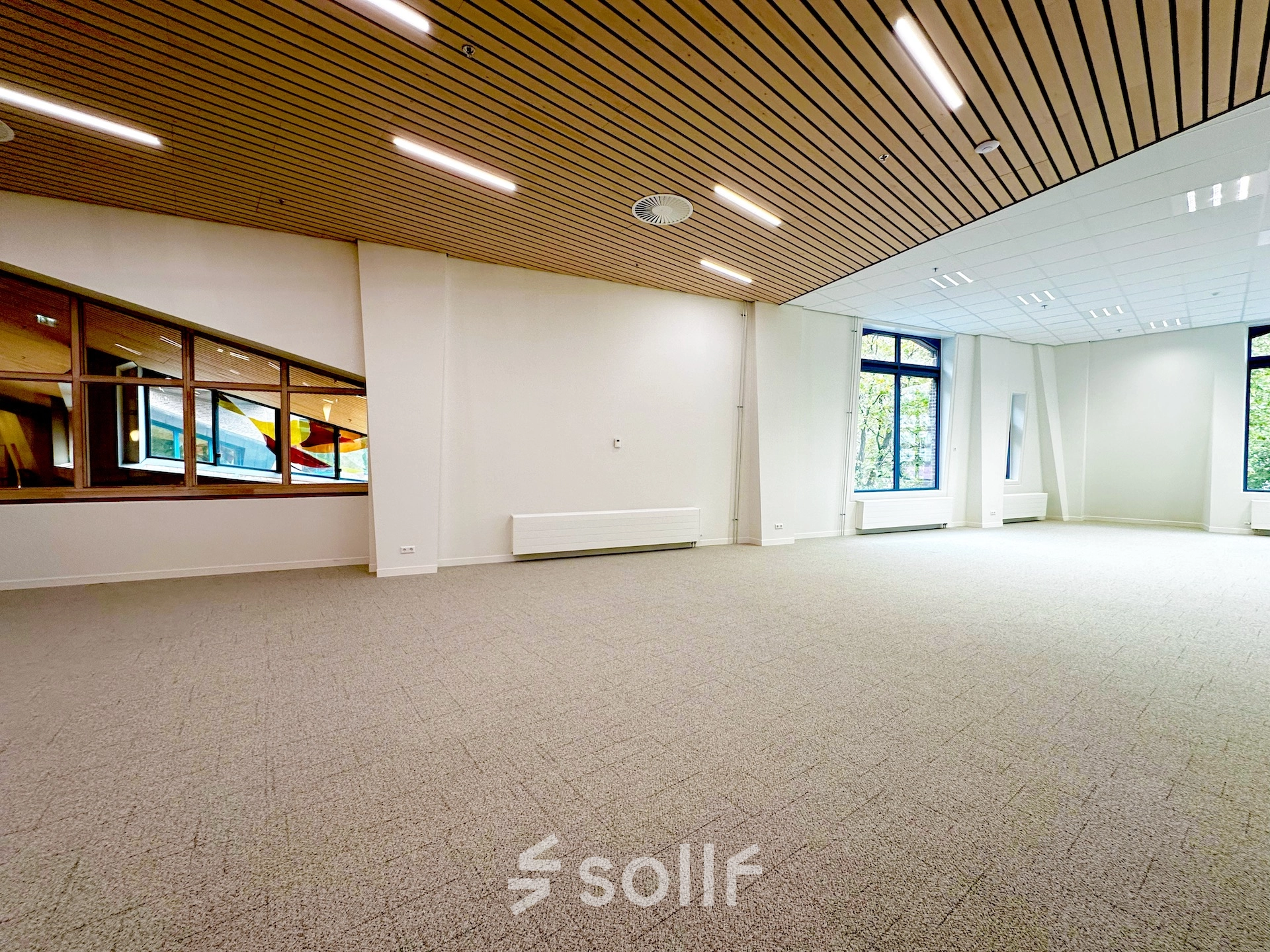 Spacious and well-lit unfurnished office space for rent at Bijlmerplein 888, Amsterdam South East, ready for customization.