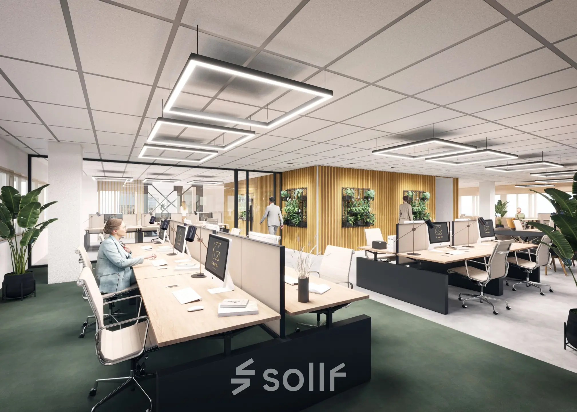 Modern office space in Amsterdam South East with workstations and greenery, suitable for rent. Professionals are engaged in work activities.