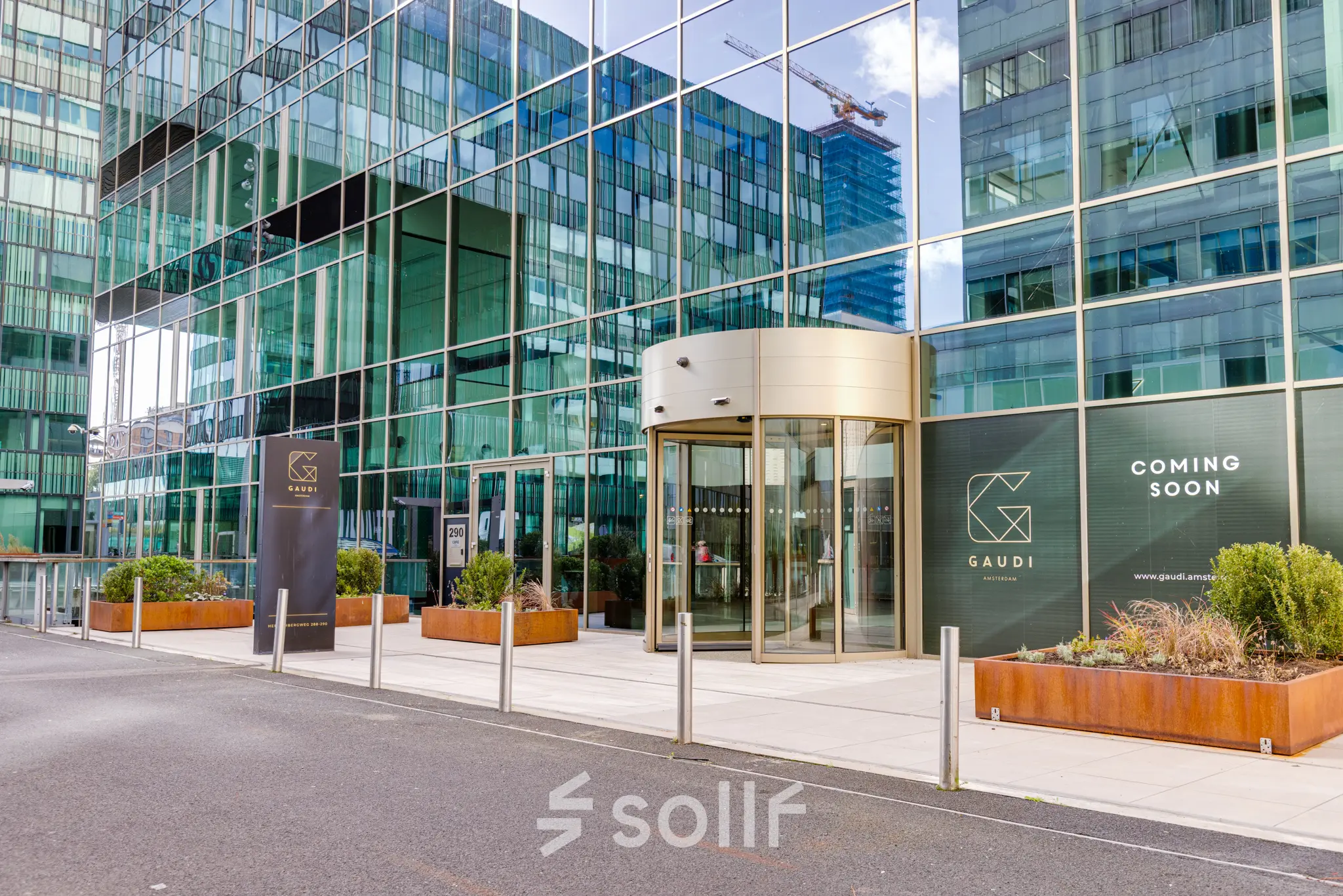 Exterior view of an office building at Herikerbergweg 290, Amsterdam South East, available for office space rental.