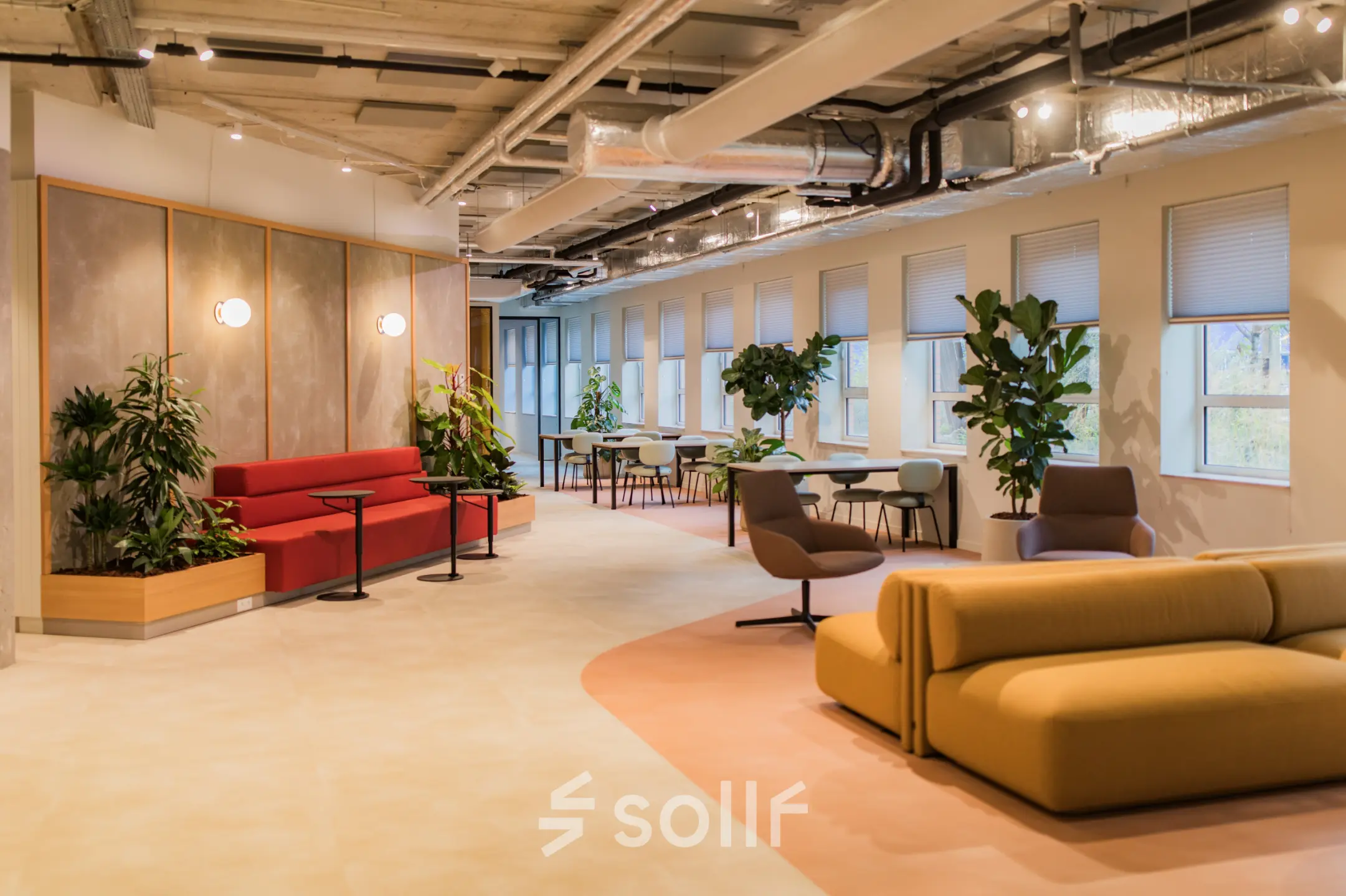 Modern office to rent at Hullenbergweg 109-135, Amsterdam South East, featuring stylish furniture and vibrant natural light.