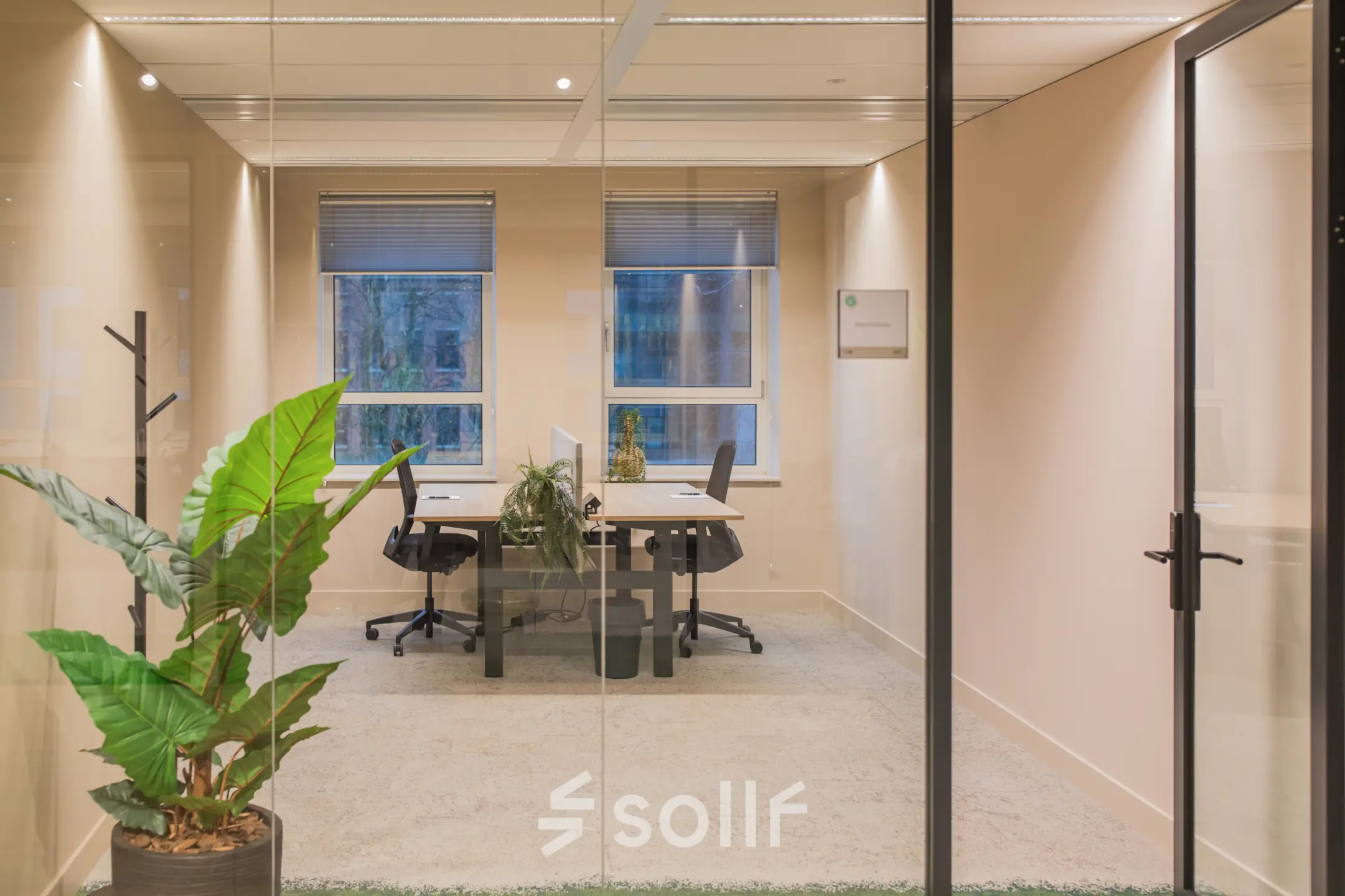 Stylish office to rent at Hullenbergweg 109-135, Amsterdam South East, featuring modern furnishings and greenery.