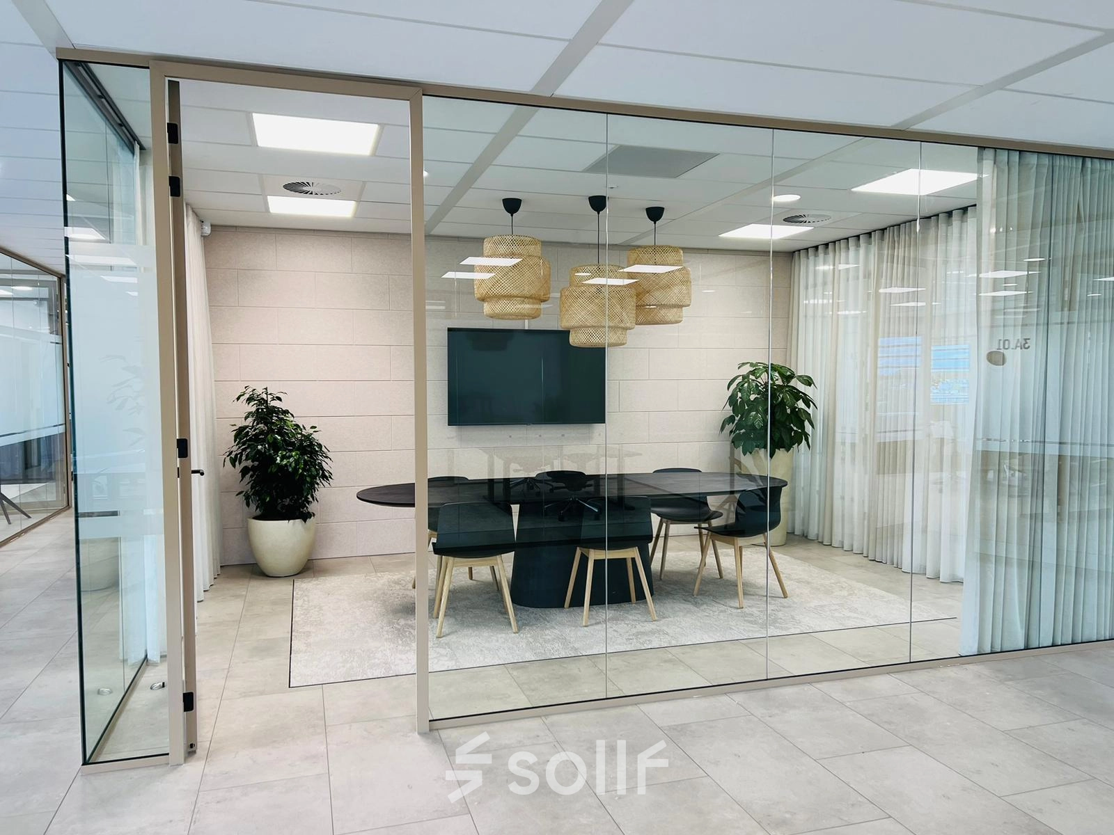 Stylish conference room available for office space rental at Laarderhoogtweg 7-19, Amsterdam South East; features modern furnishings and a sleek design.