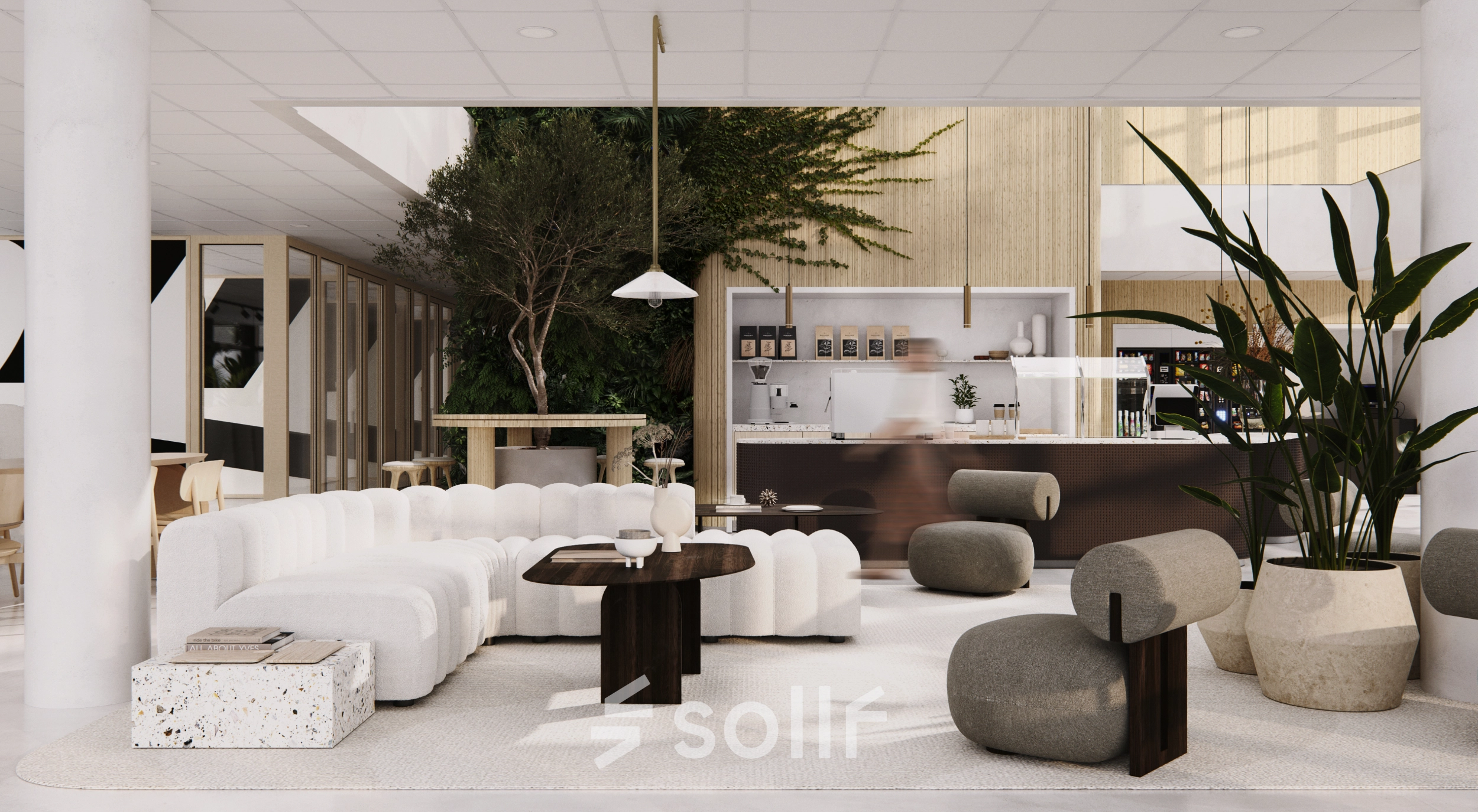 Stylish office to rent in Amsterdam South East with modern seating, lush plants, and a well-equipped coffee area, perfect for hosting informal meetings.