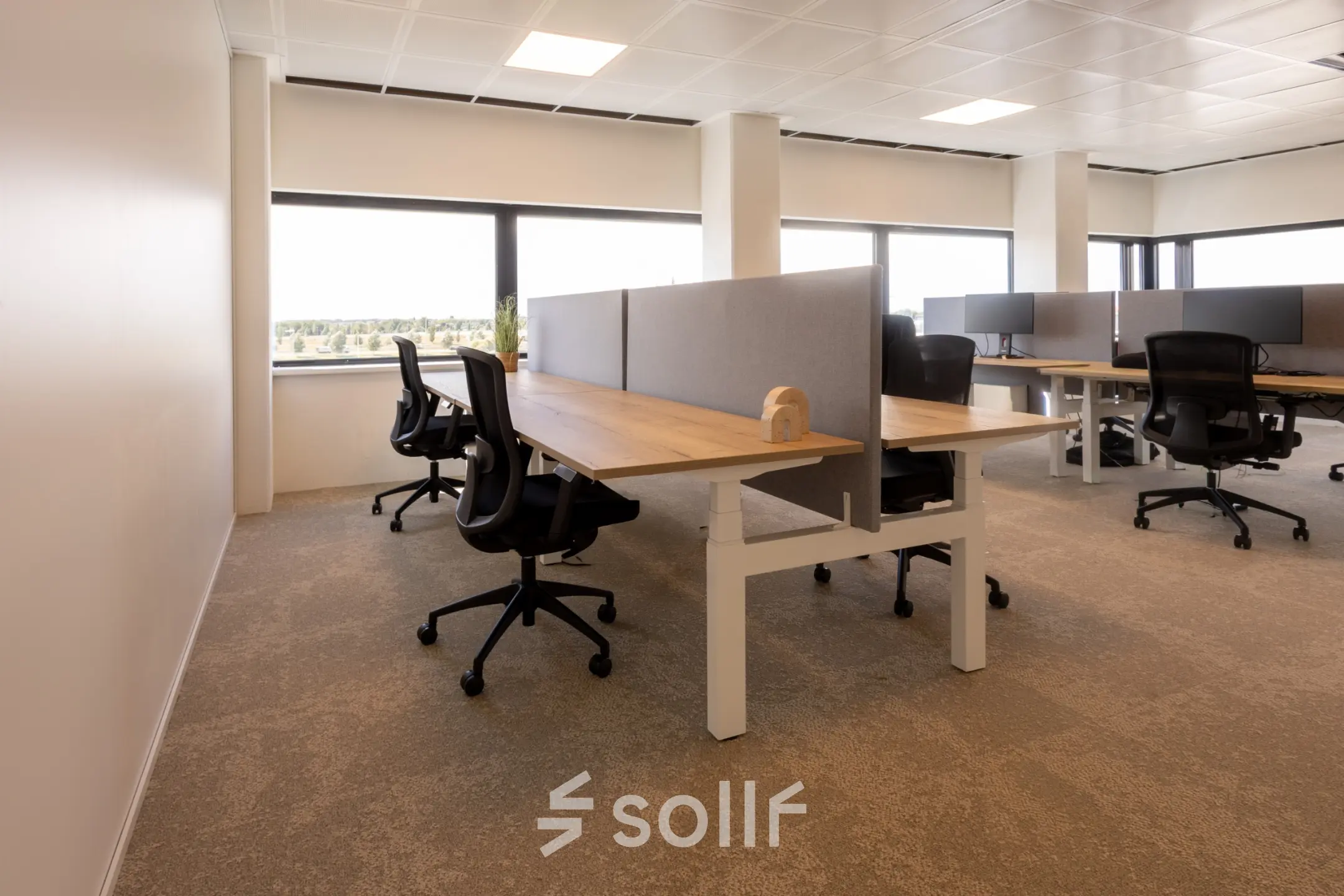Spacious office to rent at Luttenbergweg 8, Amsterdam South East, featuring modern workstations and ample natural light, ideal for office space rental.