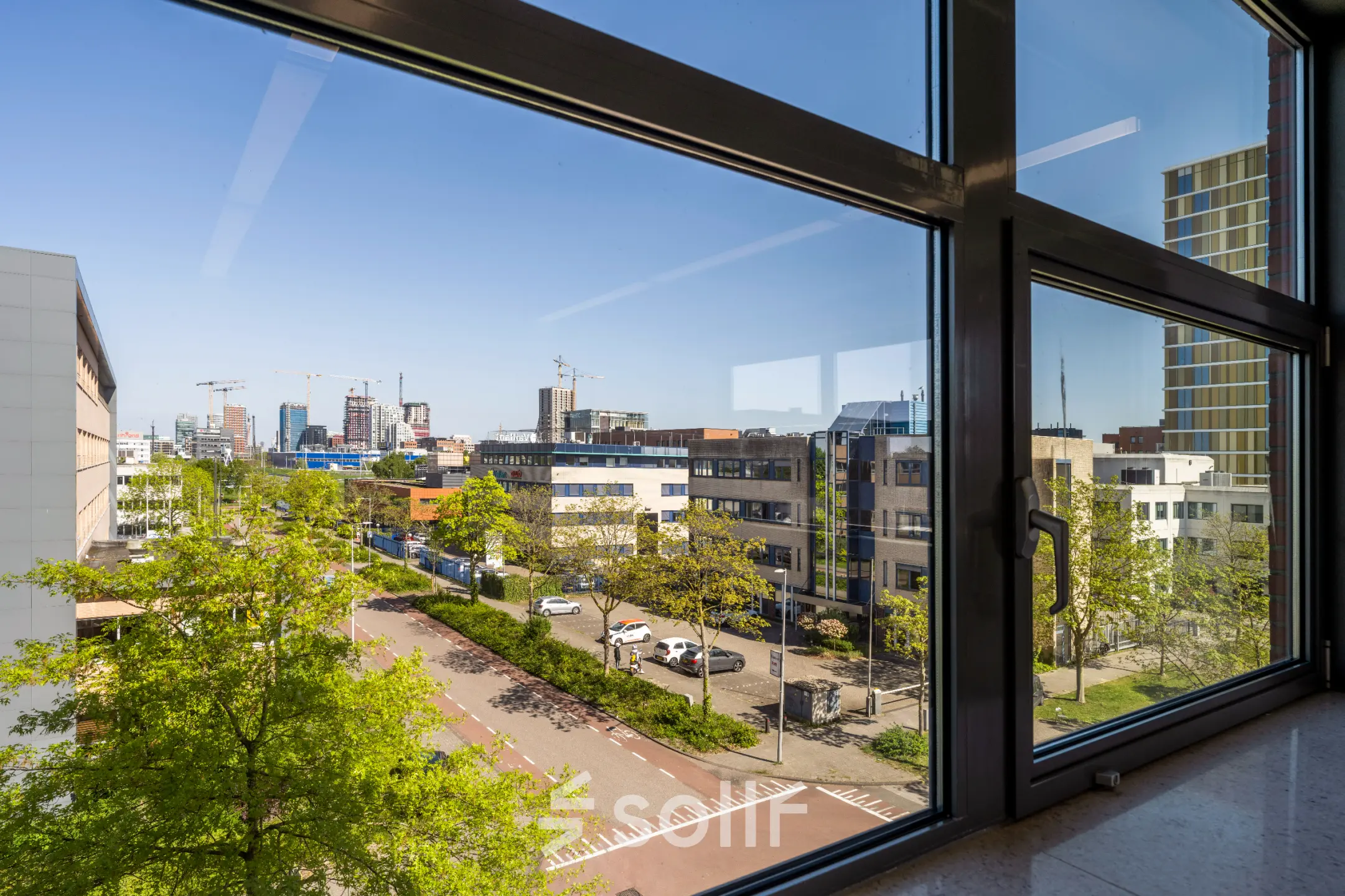 View from an office space at Paasheuvelweg 20 20, Amsterdam South East, showcasing the cityscape. Perfect for those looking to rent office space with a stunning outlook.