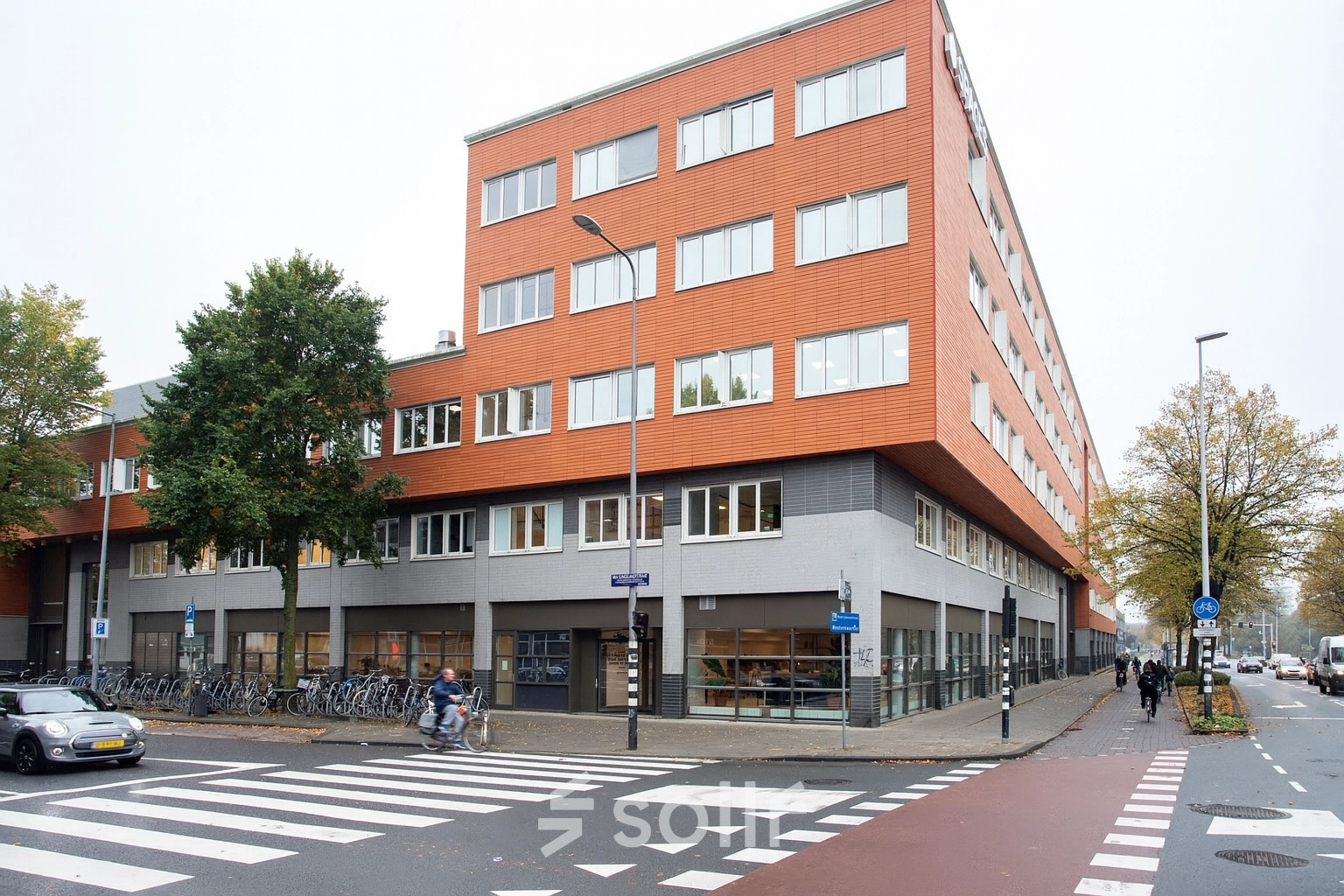 Exterior view of an office building at Haarlemmerweg 331, Amsterdam West, ideal for office space rental.