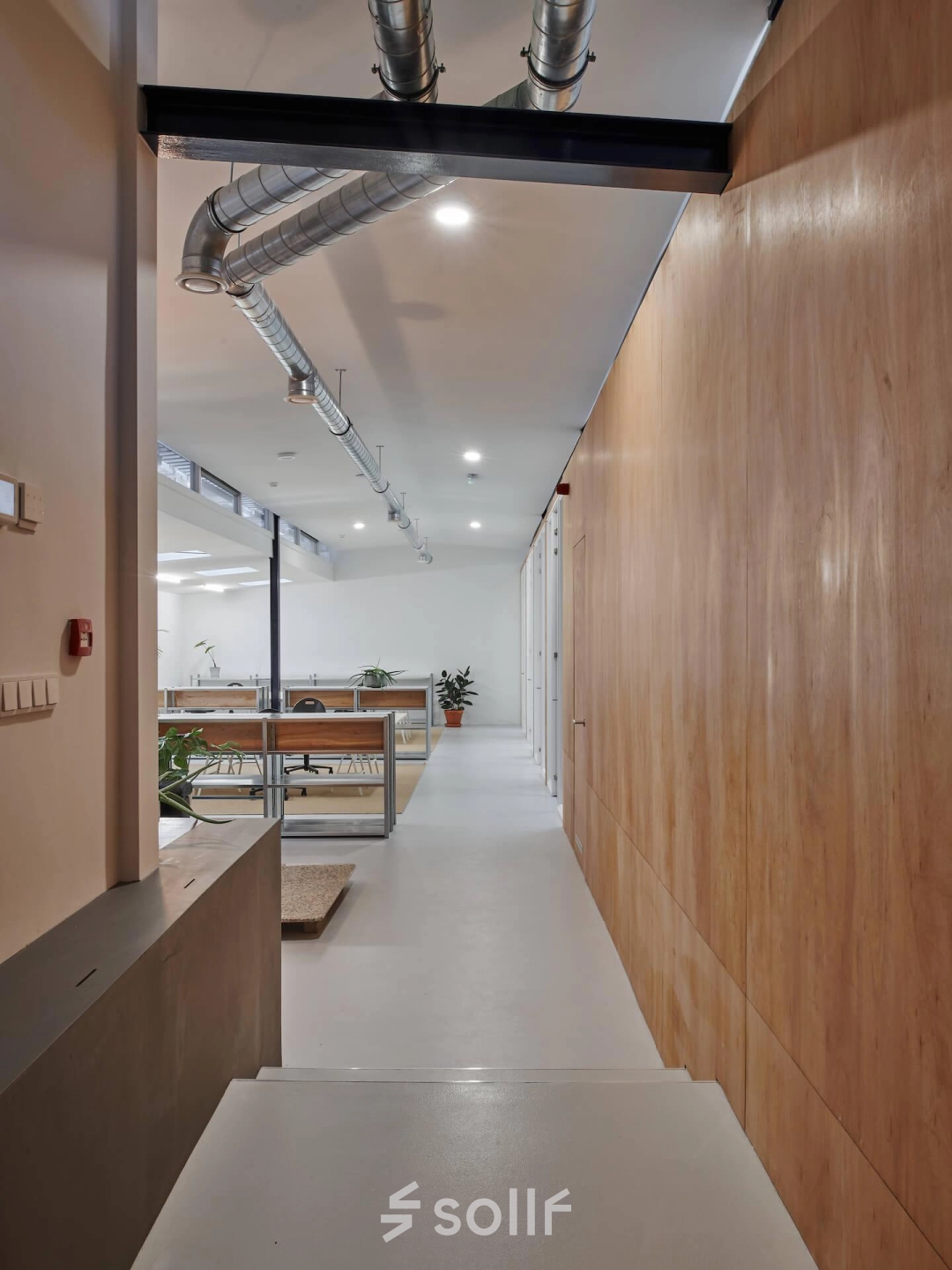 Modern interior at Hondiusstraat 7H in Amsterdam West featuring clean lines, natural light, and open floor plan ideal for office space rental.