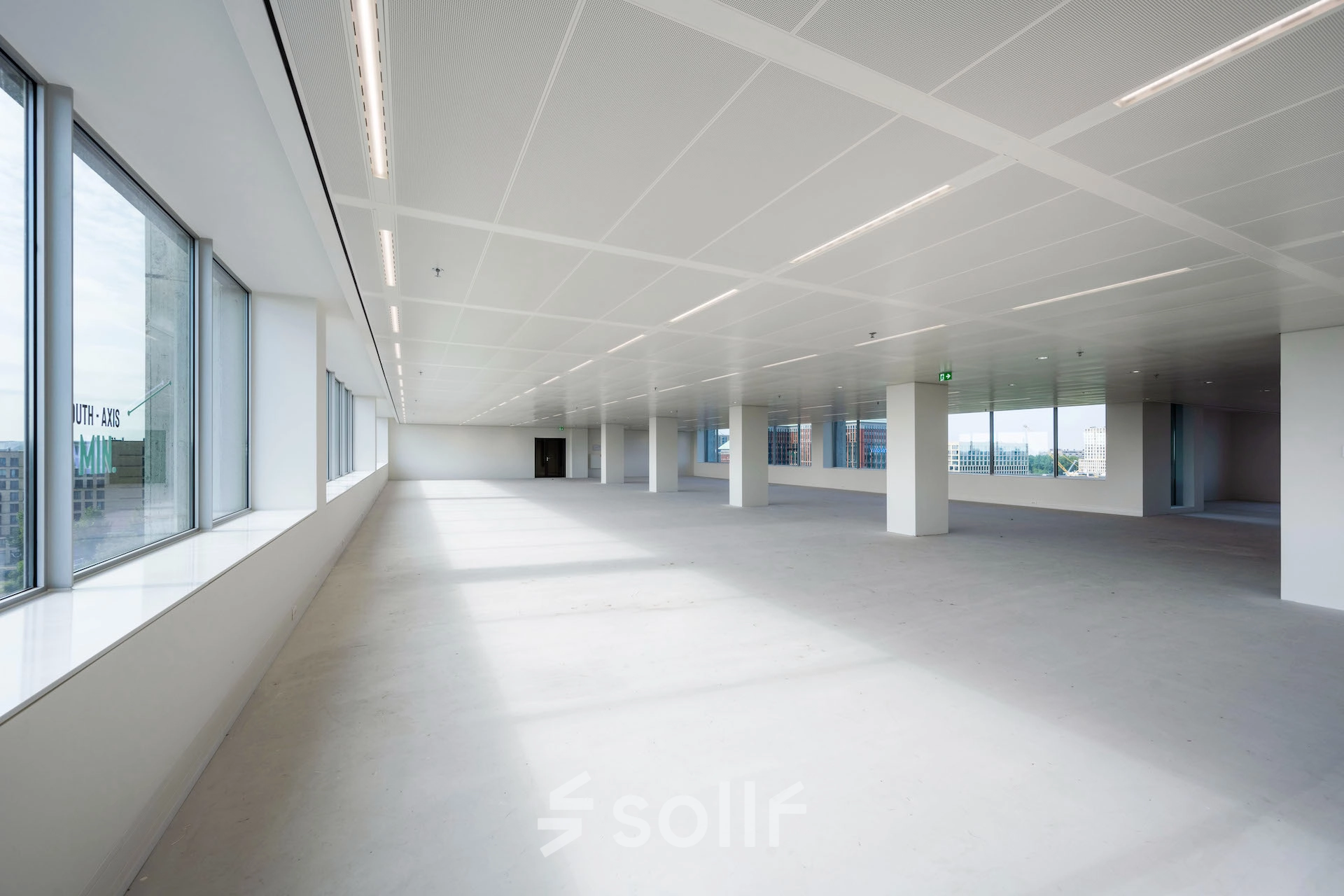 Spacious unfurnished office space with large windows at Nachtwachtlaan 20, Amsterdam West, available for rent.