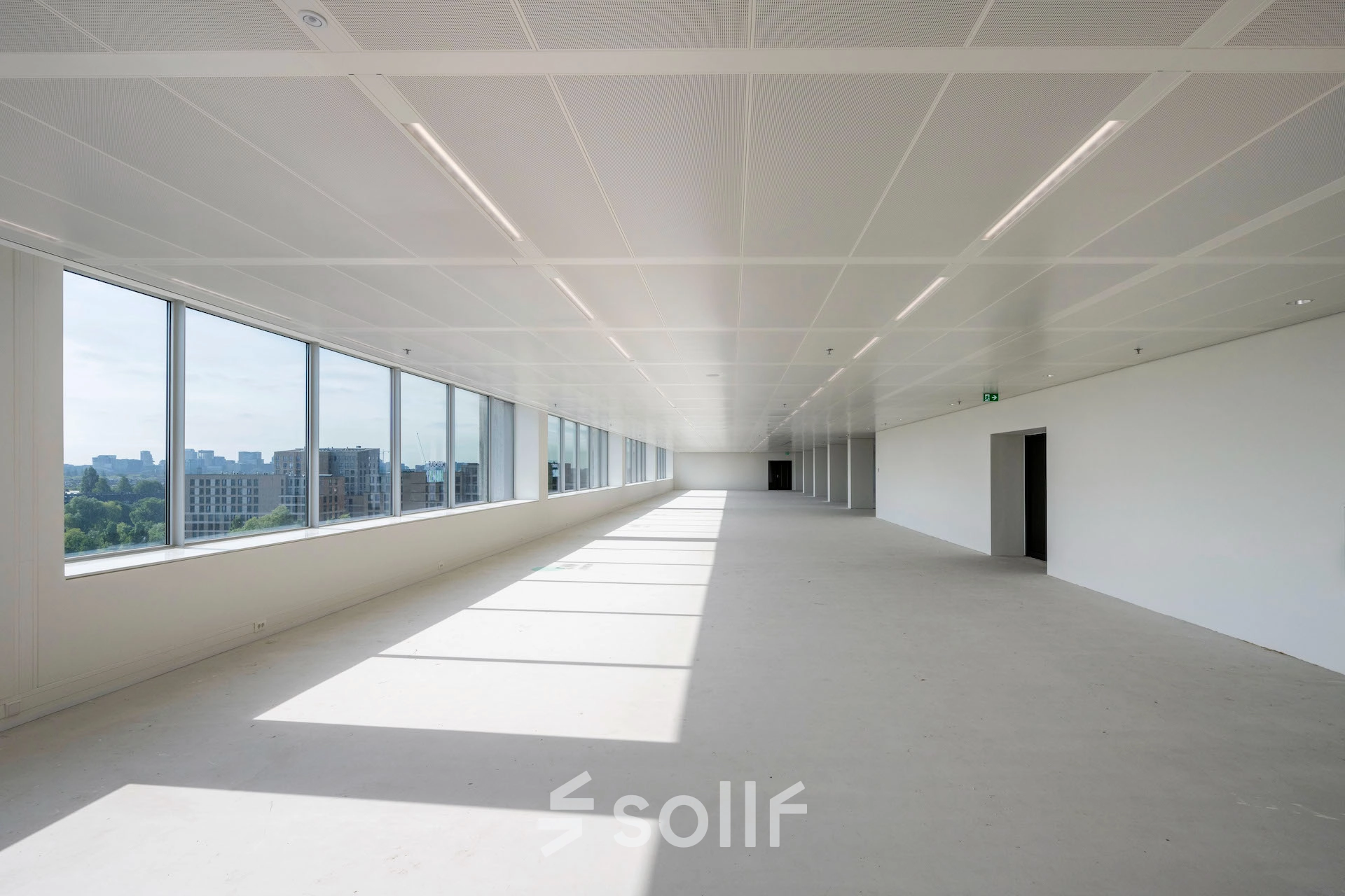 Spacious, unfurnished office to rent at Nachtwachtlaan 20, Amsterdam West, with large windows and an open floor plan ideal for office space rental.