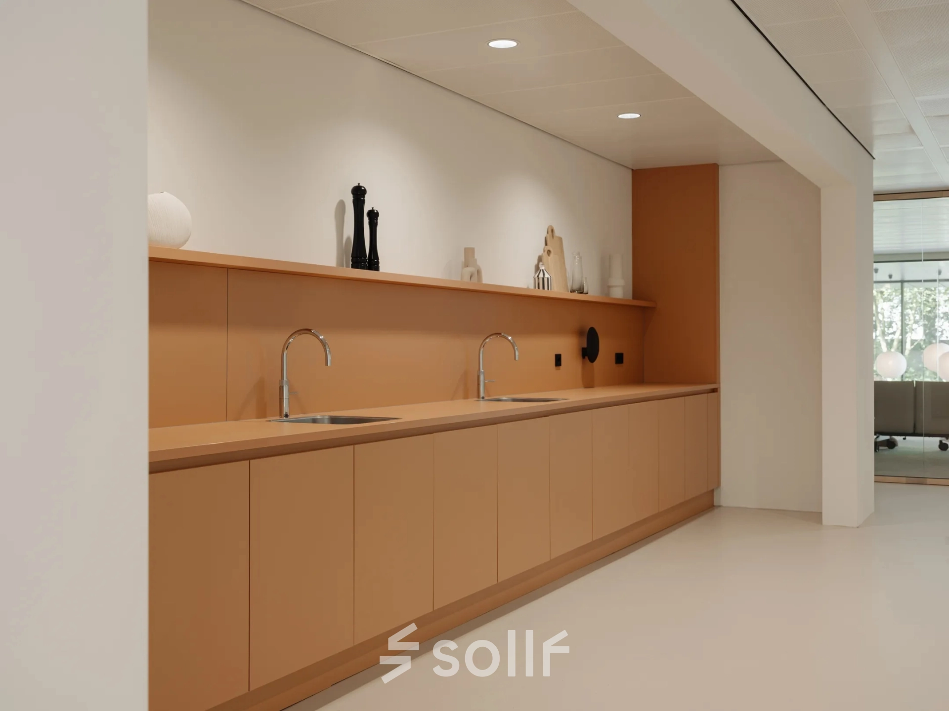 Contemporary office space at Nachtwachtlaan 20 in Amsterdam West, featuring a sleek kitchenette with modern fixtures. Ideal for those seeking office space rental.