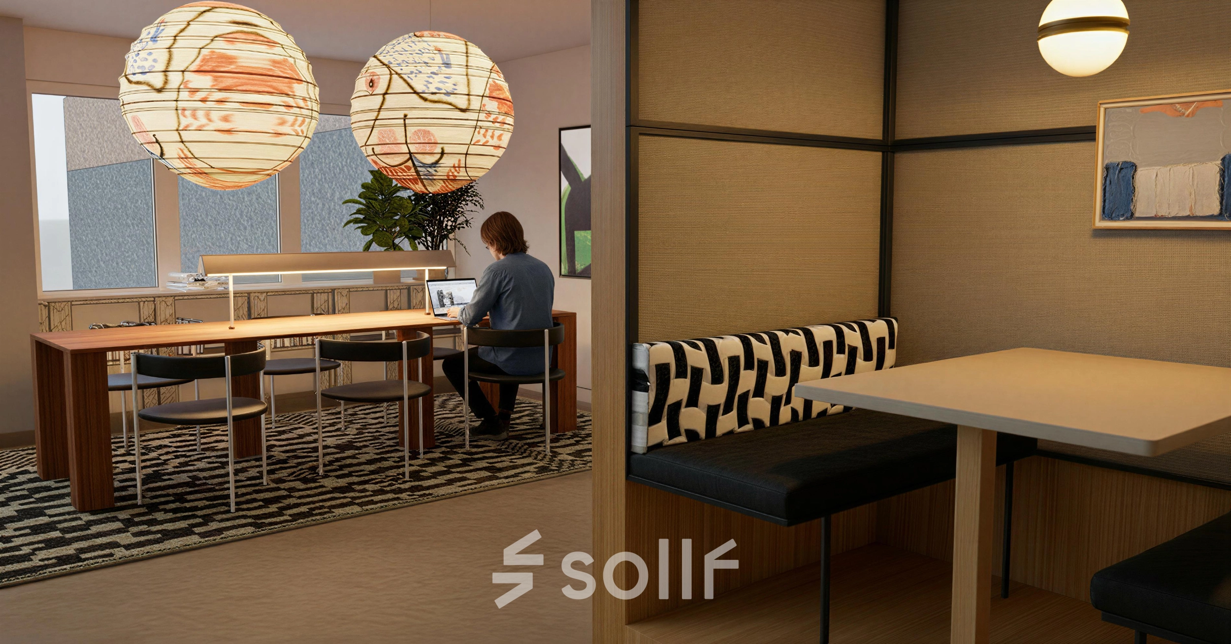 A furnished office space with a person using a laptop at Barbara Strozzilaan 101 101, Amsterdam Zuidas. Ideal for office space rental, featuring modern seating and decorative lighting.