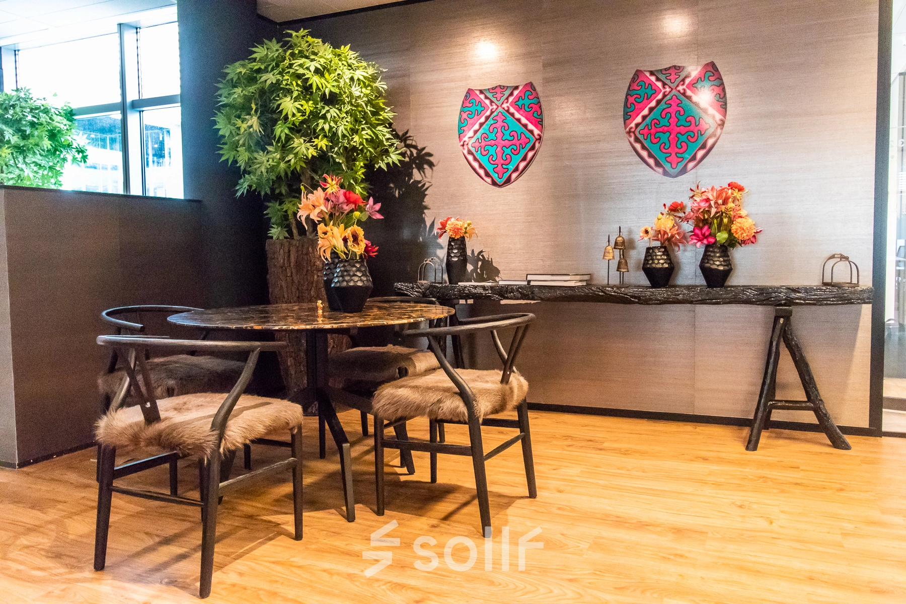 Inviting furnished office space with vibrant decor at Claude Debussylaan 7-29, Amsterdam Zuidas, perfect for office space rental.