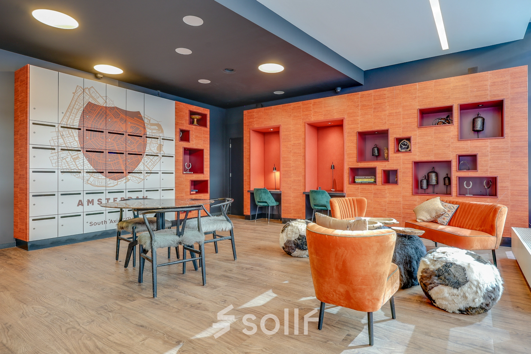 Stylish office space rental at Gustav Mahlerlaan 308, Amsterdam Zuidas with vibrant seating and modern decor, ideal for professional use.