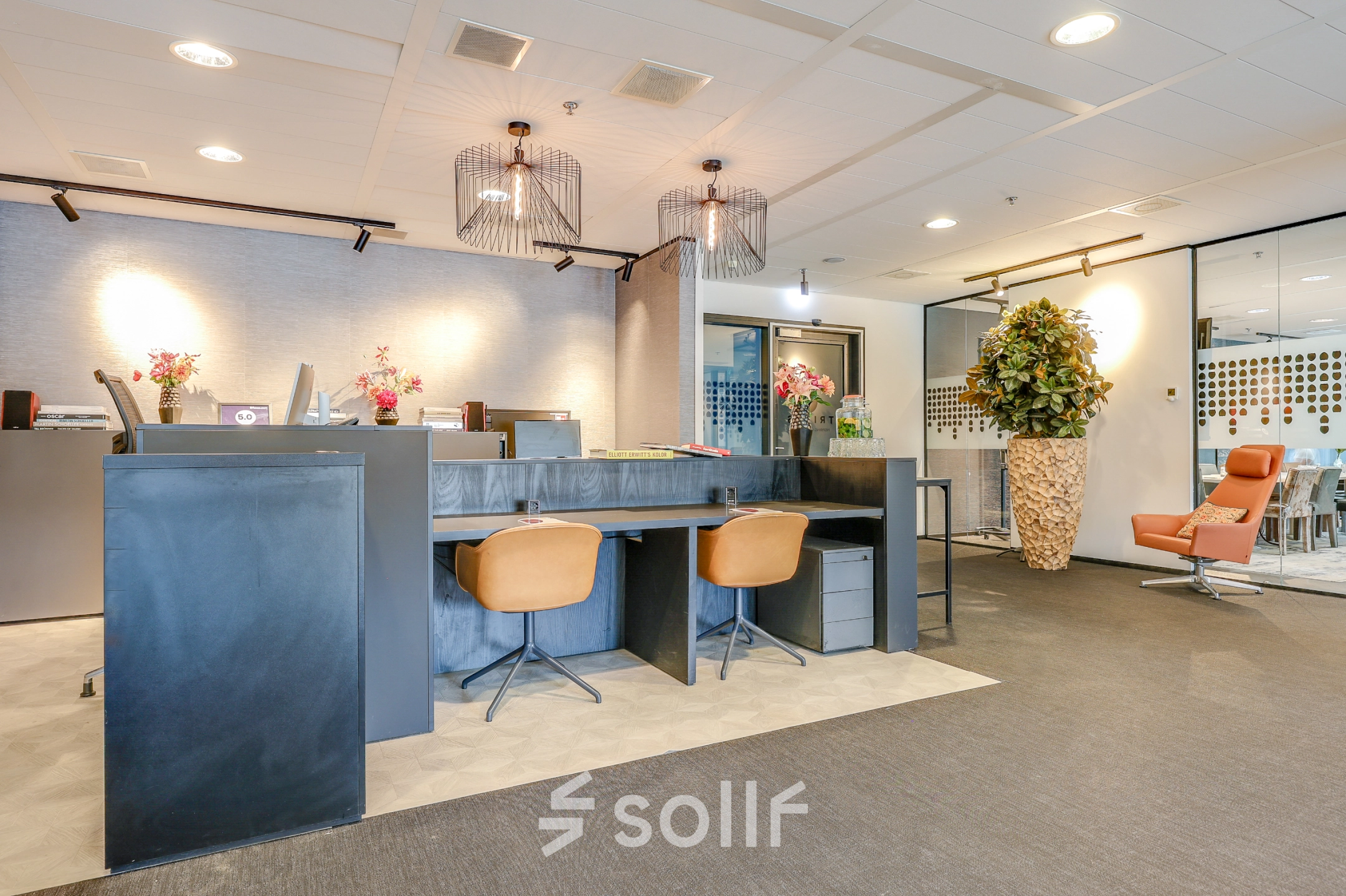 Modern furnished office space at Gustav Mahlerplein, featuring sleek desks and comfortable chairs, perfect for office space rental in Amsterdam Zuidas.