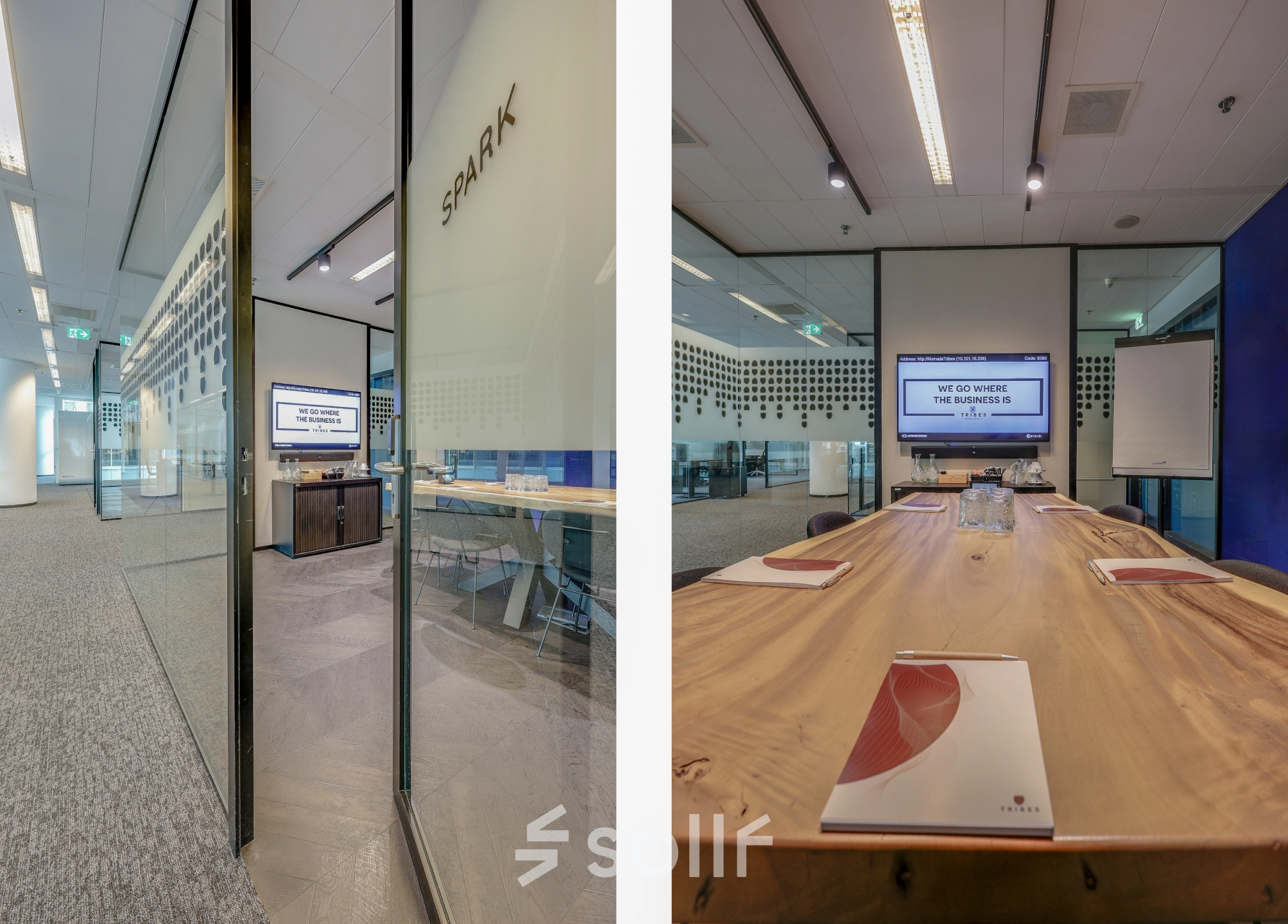 Modern office space at Gustav Mahlerplein 28 & 58-60, Amsterdam Zuidas, featuring a glass-walled meeting room with a large wooden table and audio-visual equipment, ideal for office space rental.