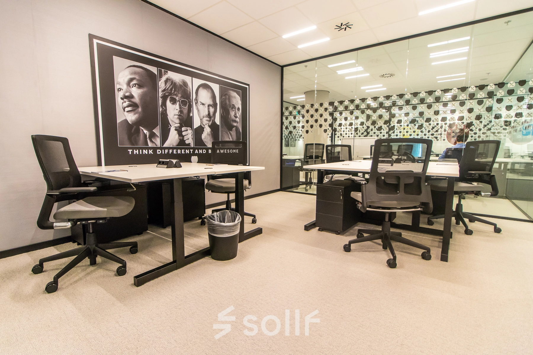 Spacious and modern office to rent in Amsterdam Zuidas at Gustav Mahlerplein. Features contemporary furnishings and a unique wall design, ideal for team collaborations or meetings.
