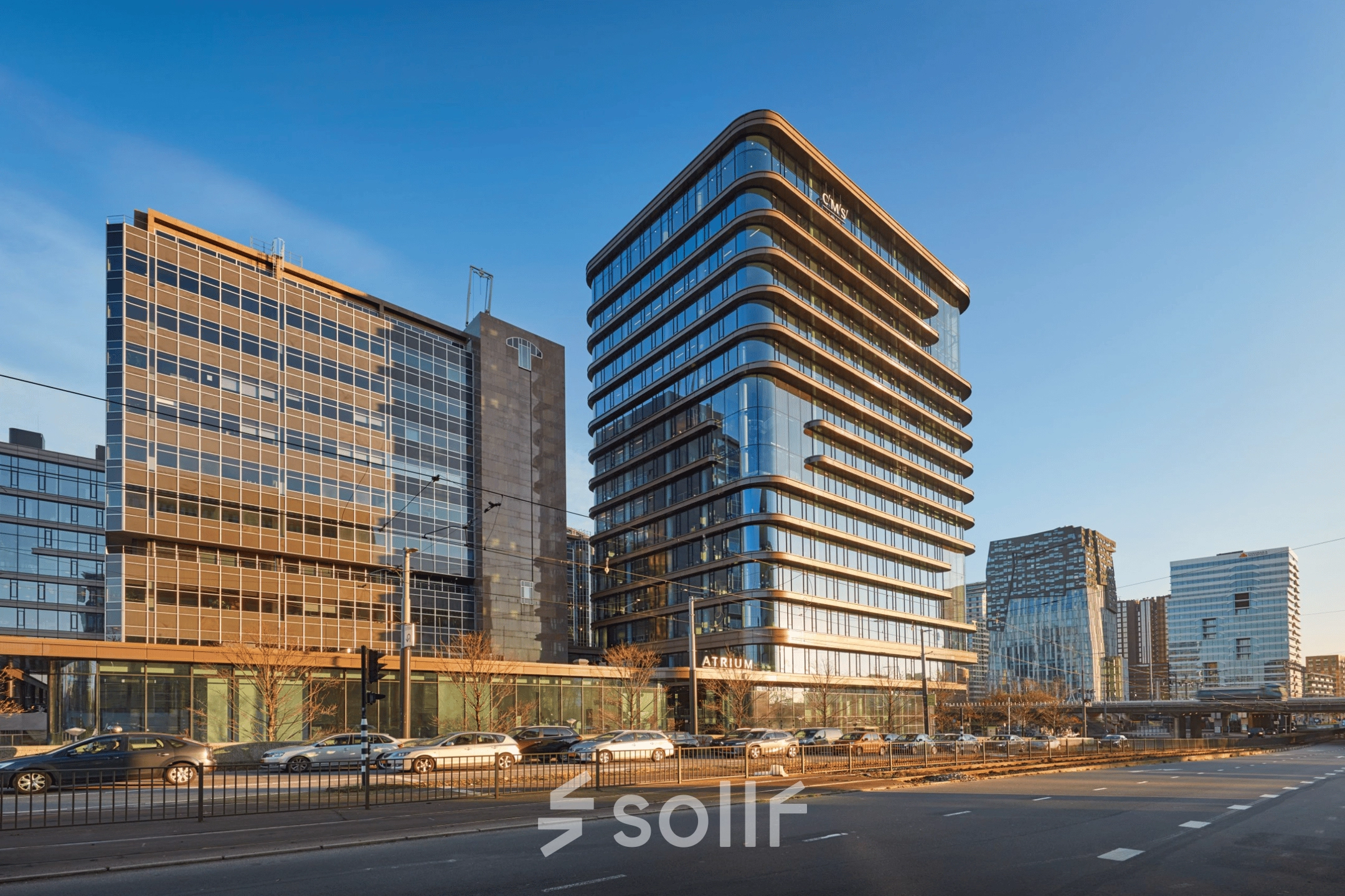 Exterior view of modern office buildings at Strawinskylaan 3051, Amsterdam Zuidas, perfect for office space rental.