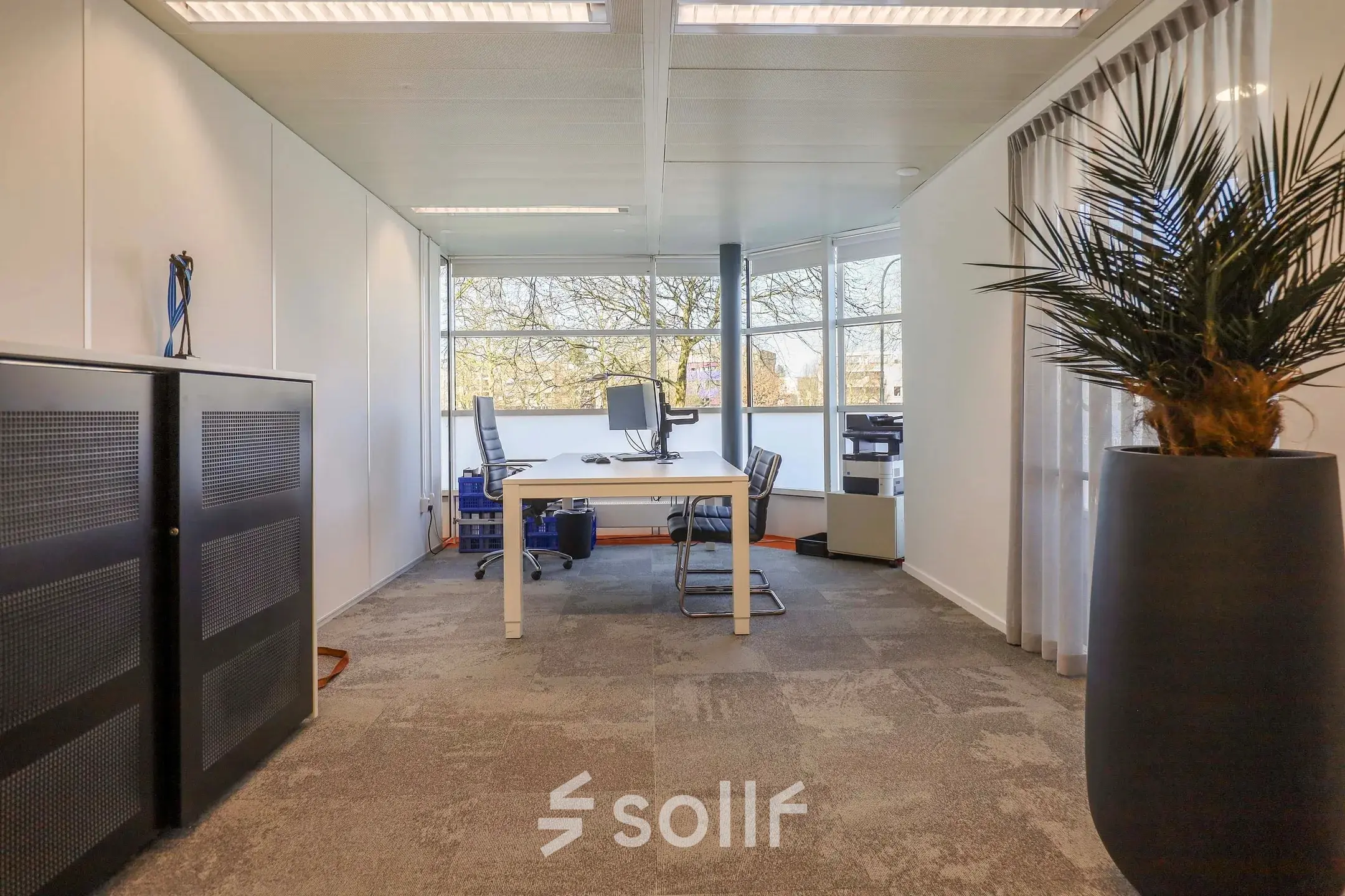 Bright office space for rent at Prins Willem-Alexanderlaan 301, Apeldoorn, featuring modern furnishings and ample natural light.