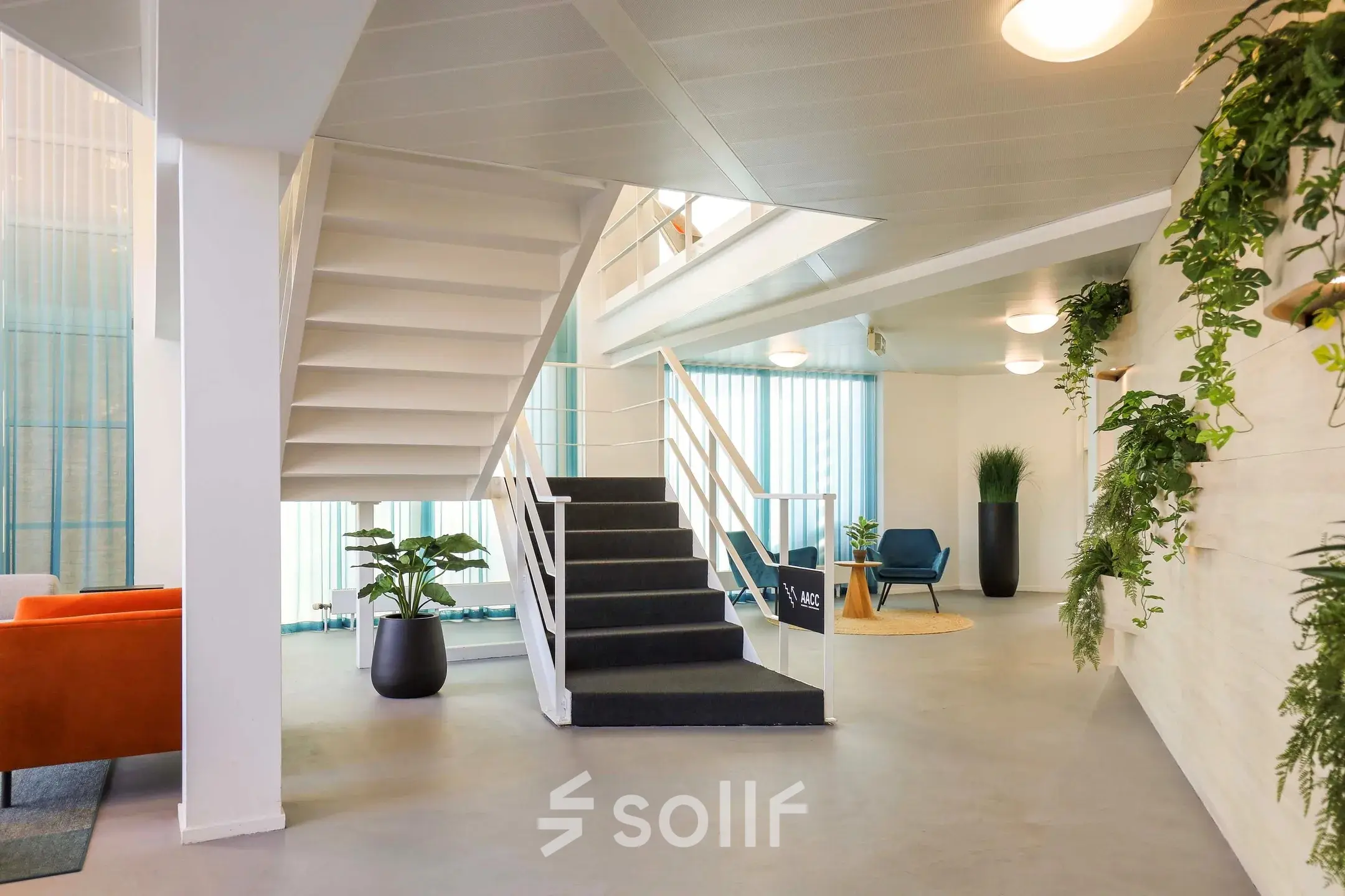Spacious office interior at Prins Willem-Alexanderlaan 301, Apeldoorn, featuring stylish furnishings, seating areas, and modern decor, ideal for office space rental.