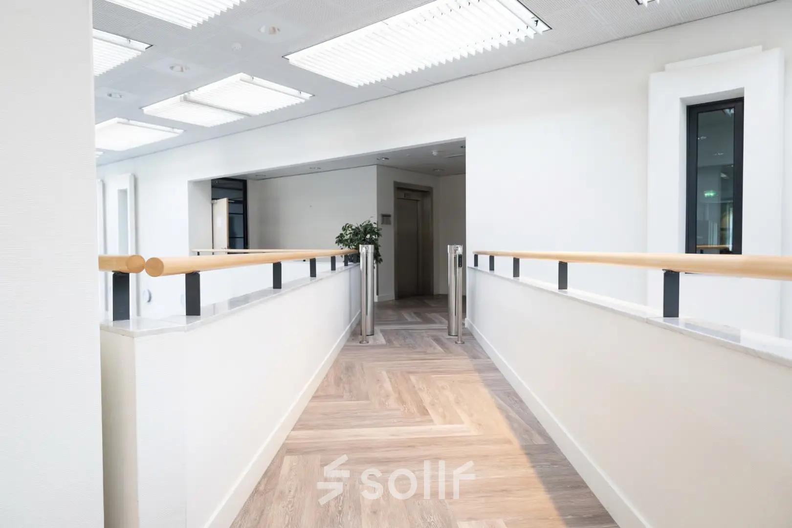 Bright hallway interior at Schumanpark 9, Apeldoorn, ideal for office space rental.