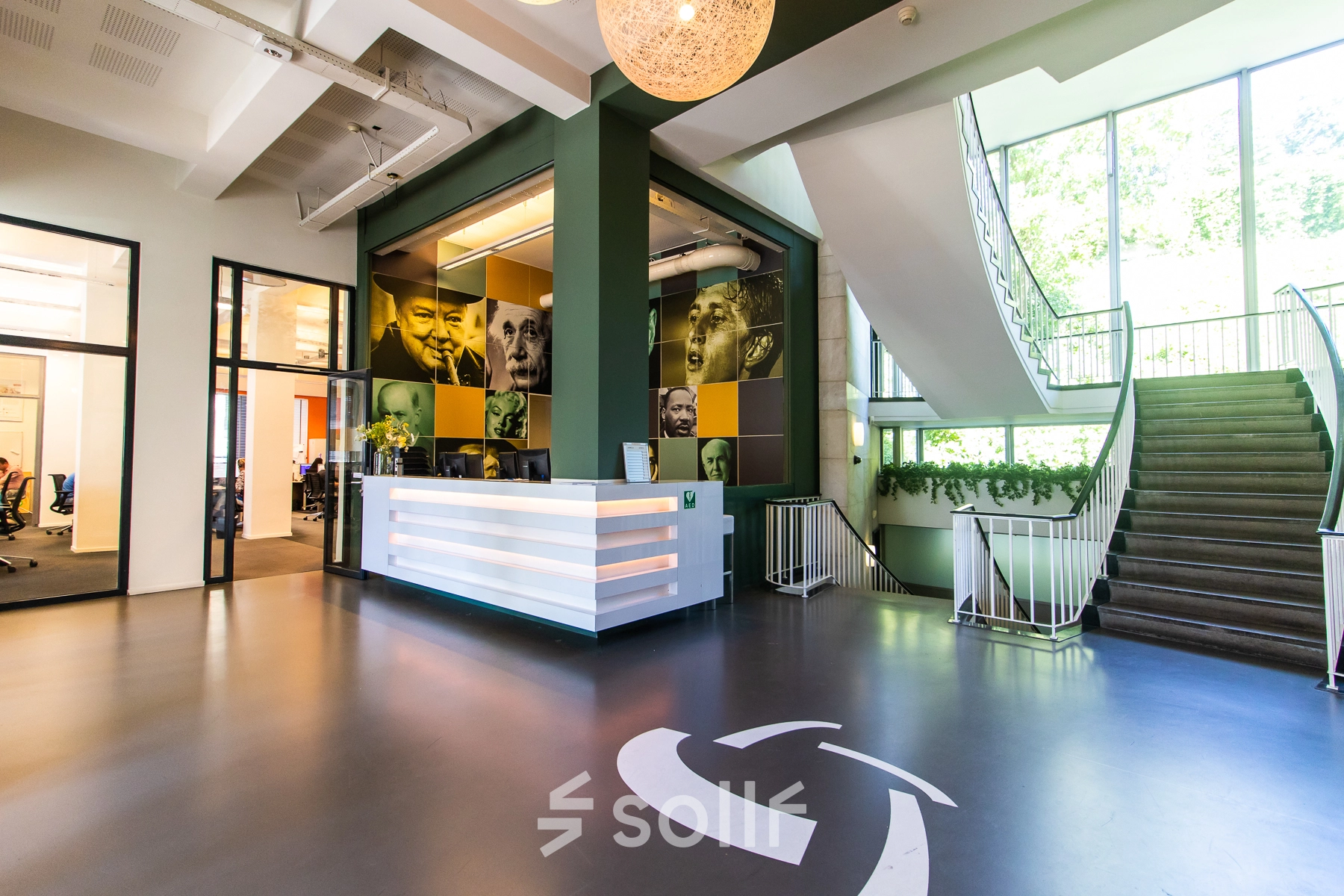 Modern office to rent at Jansbuitensingel 7 in Arnhem Centrum, featuring a stylish reception area with natural light and contemporary décor.
